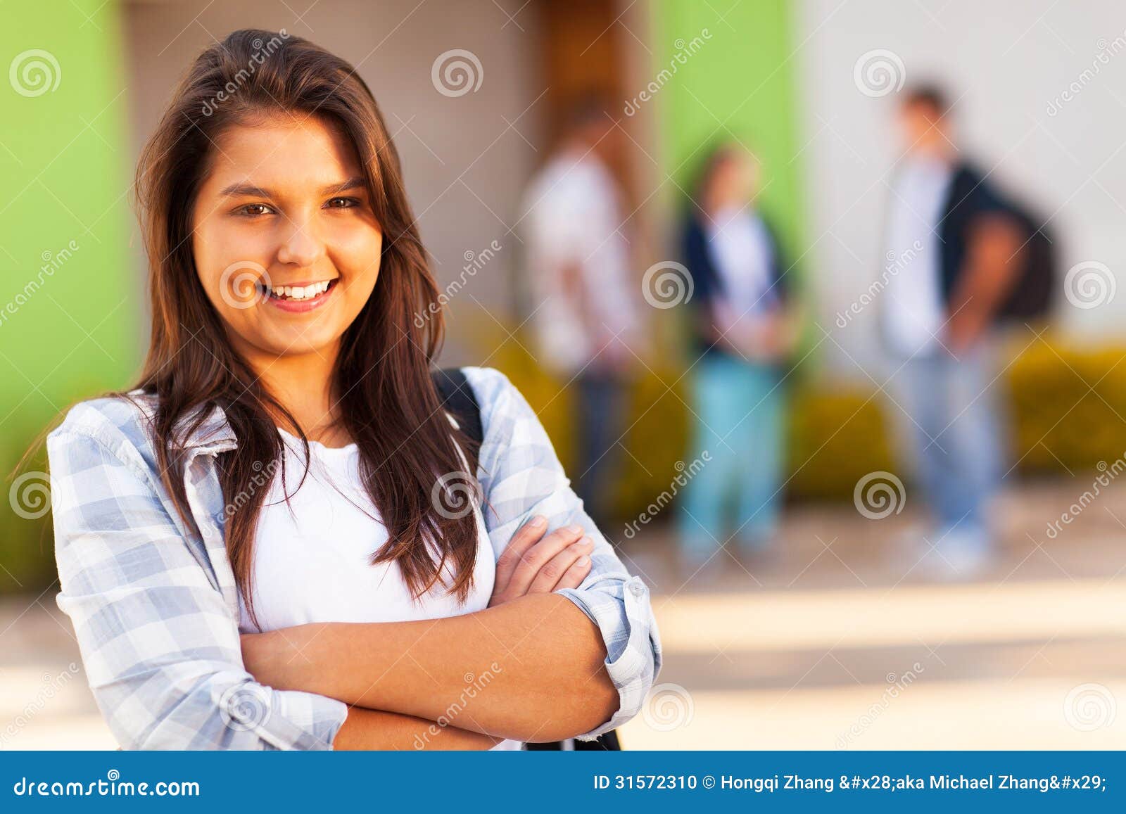 teen school girl portrait cute high arms folded 31572310