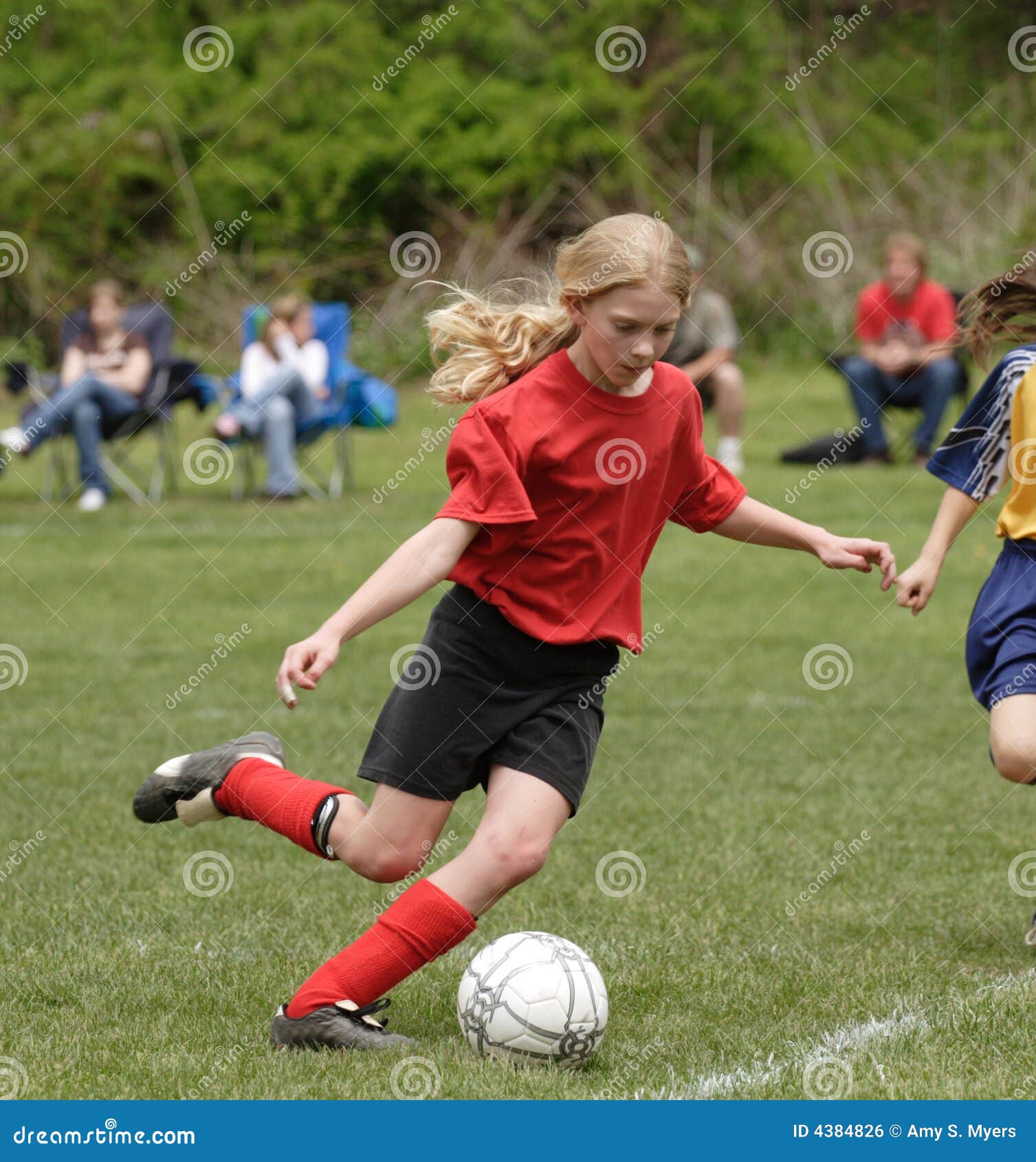 Teen Youth Soccer Player Kicking Ball Stock Photography | CartoonDealer ...