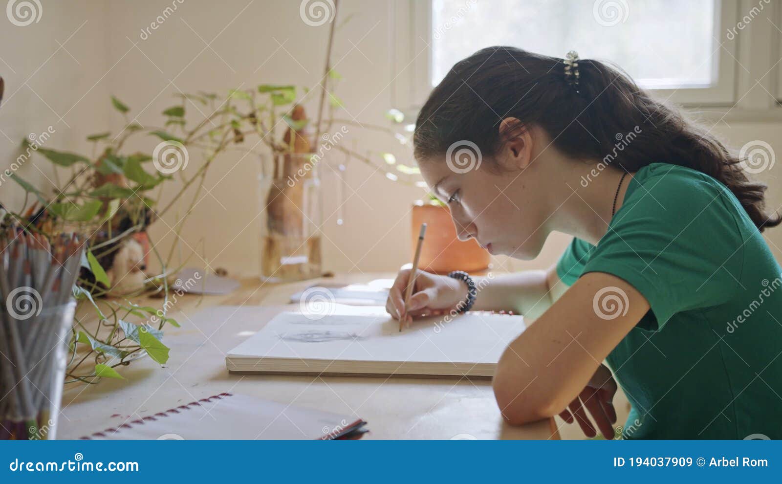 Teenage Girl Draws Sketchbook While Sitting Stock Photo 2034569108