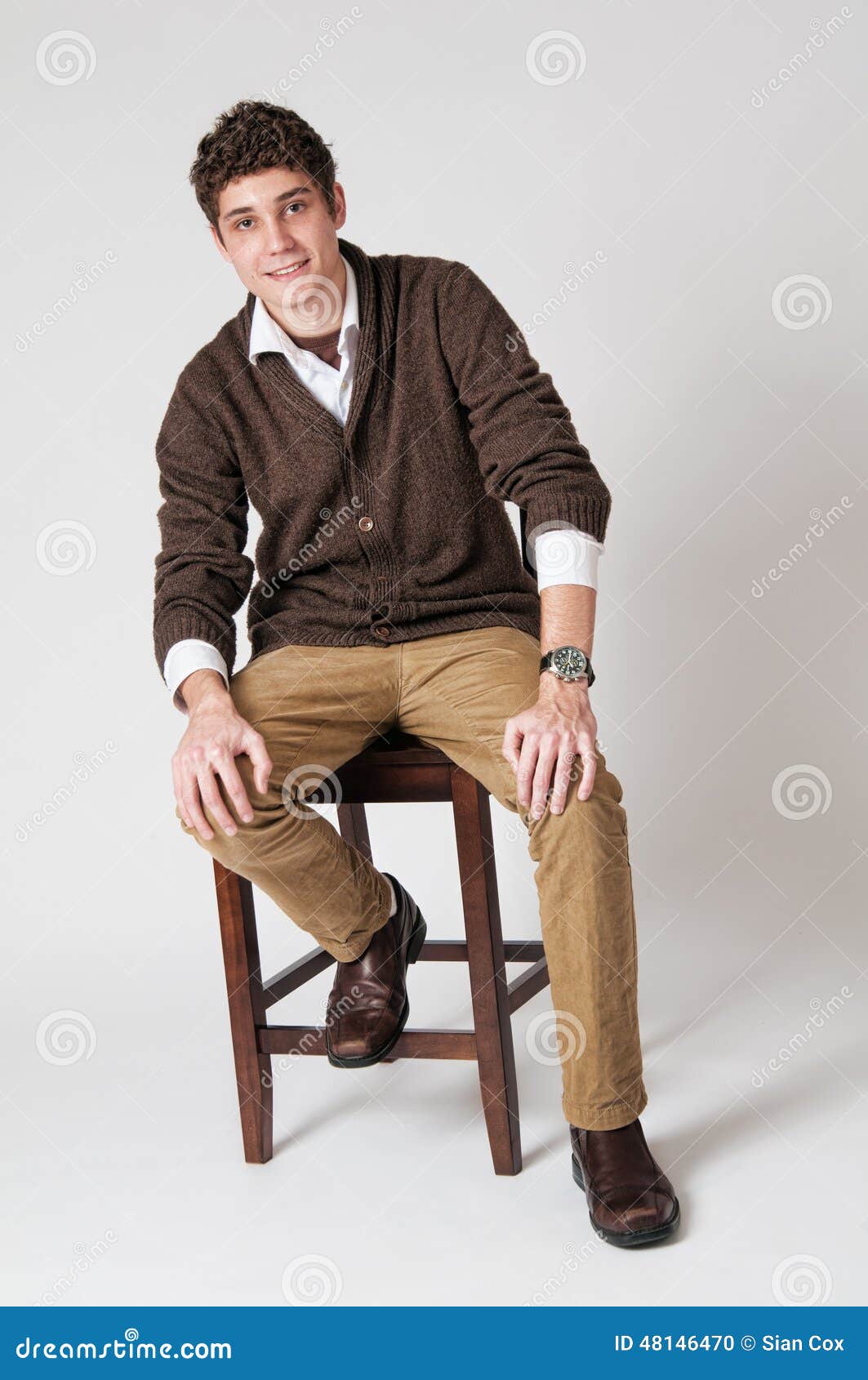 Teenage boy stock photo. Image of teeth, caucasian, stool - 48146470