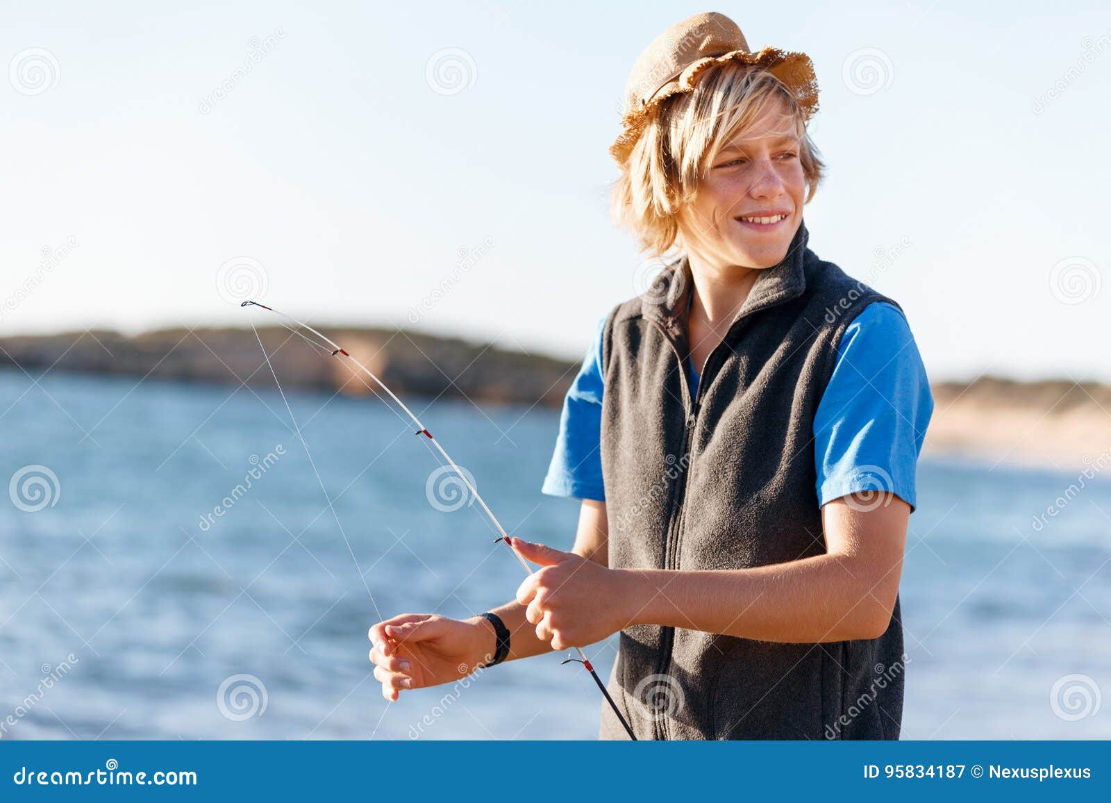 https://thumbs.dreamstime.com/z/teenage-boy-fishing-sea-rod-95834187.jpg