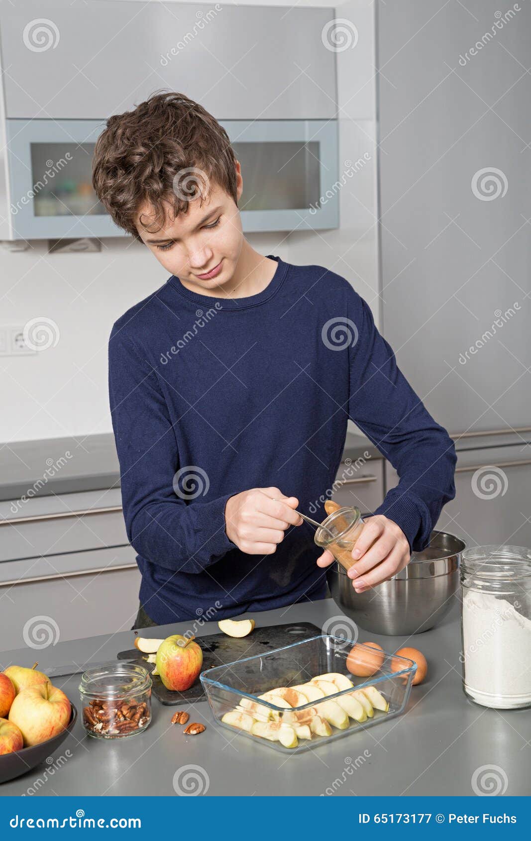 Teenage Boy in the kitchen stock image. Image of food 65173177