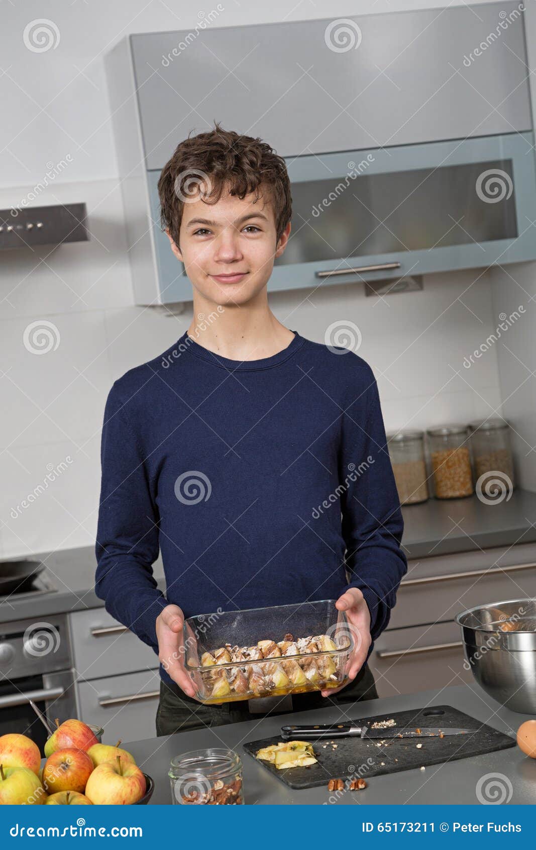 Teenage Boy in the kitchen stock image. Image of modern 65173211