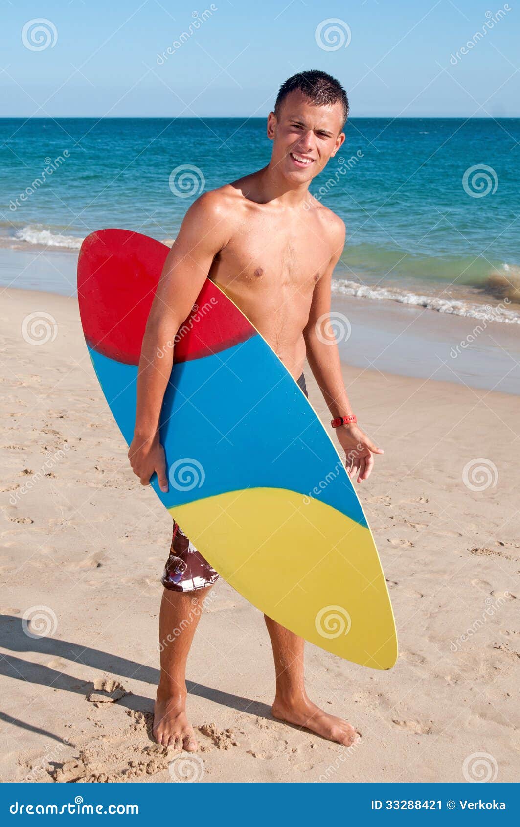 Teenage boy stock image. Image of holding, beach, male - 33288421