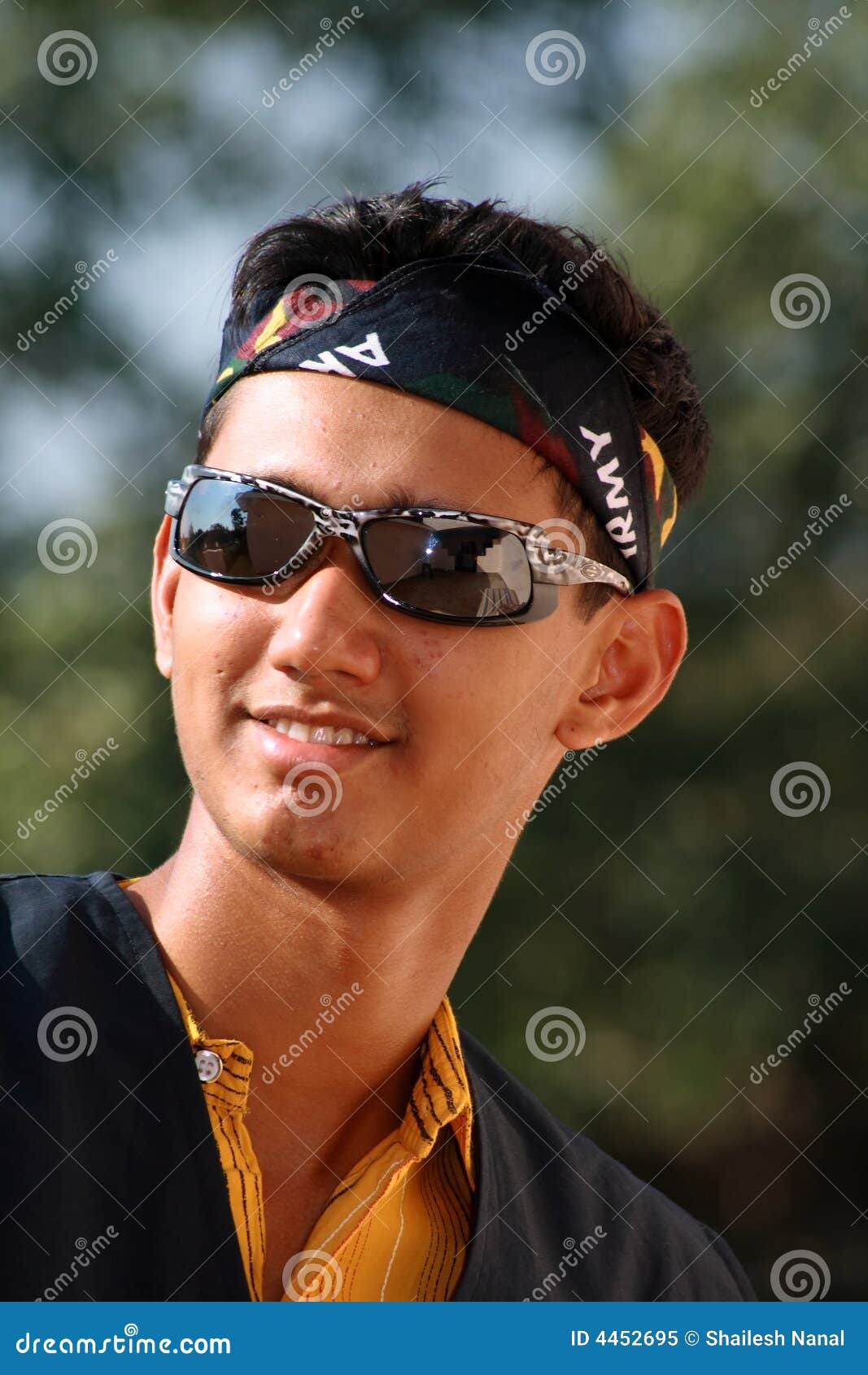 Teenage Boy in Sunglasses stock image. Image of bandana 4452695