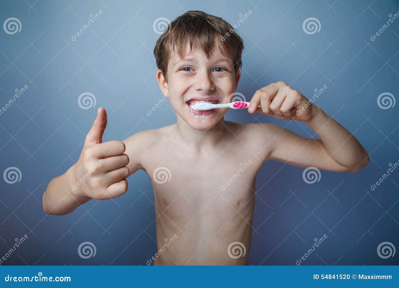 A Boy Of 10 Years Of European Appearance With Stock Photo 