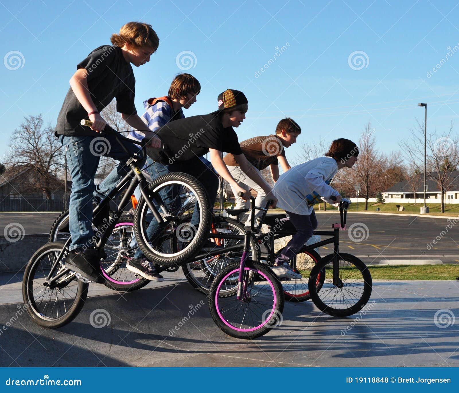 boys riding bikes