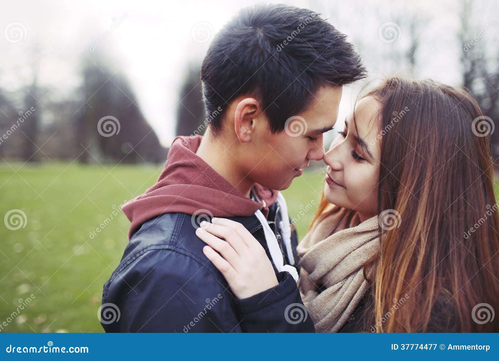 Teenage Couple Sharing A Romantic Moment Stock Image