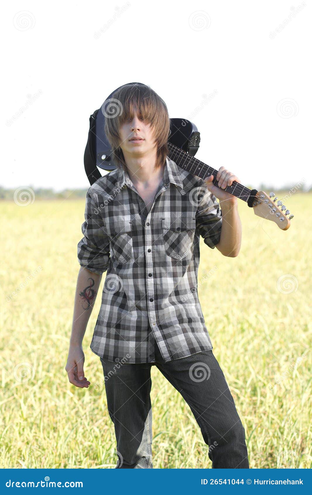Teenage emo guitarist stock photo. Image of cool, tattoo 26541044