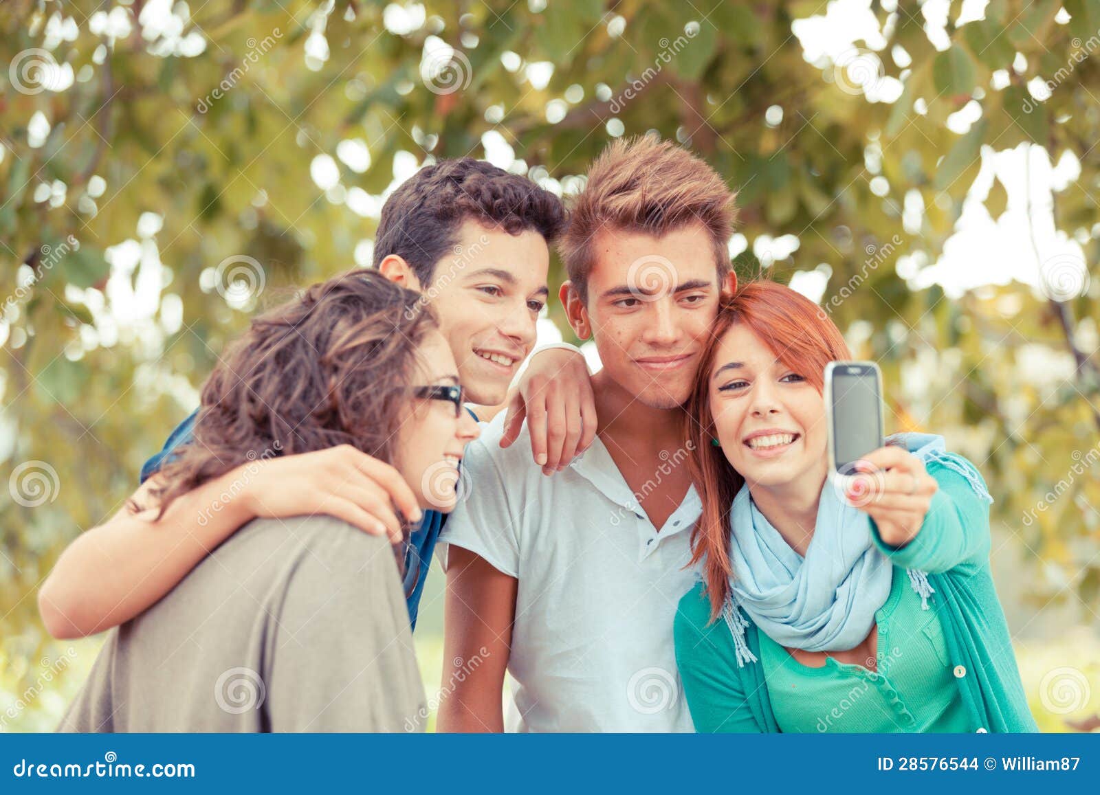 teenage friends taking self portraits