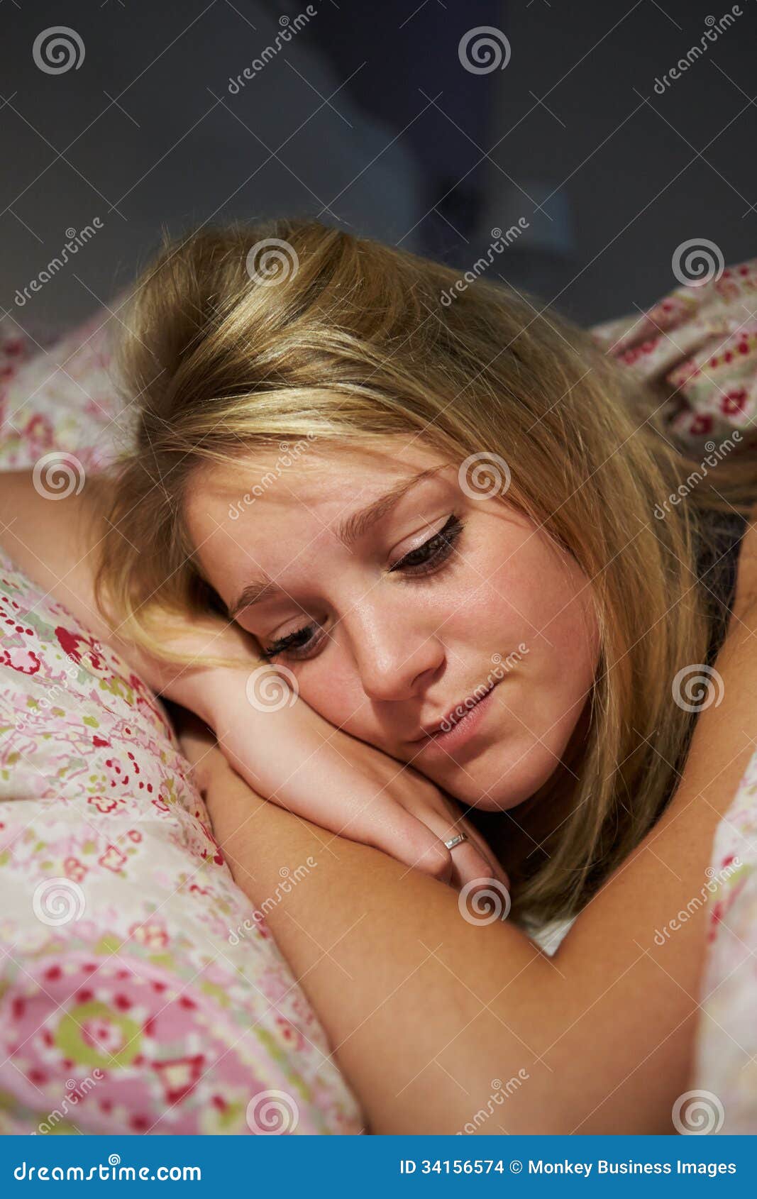 Teenage Girl Awake In Bed Suffering With Insomnia Stock Photo - Image ...