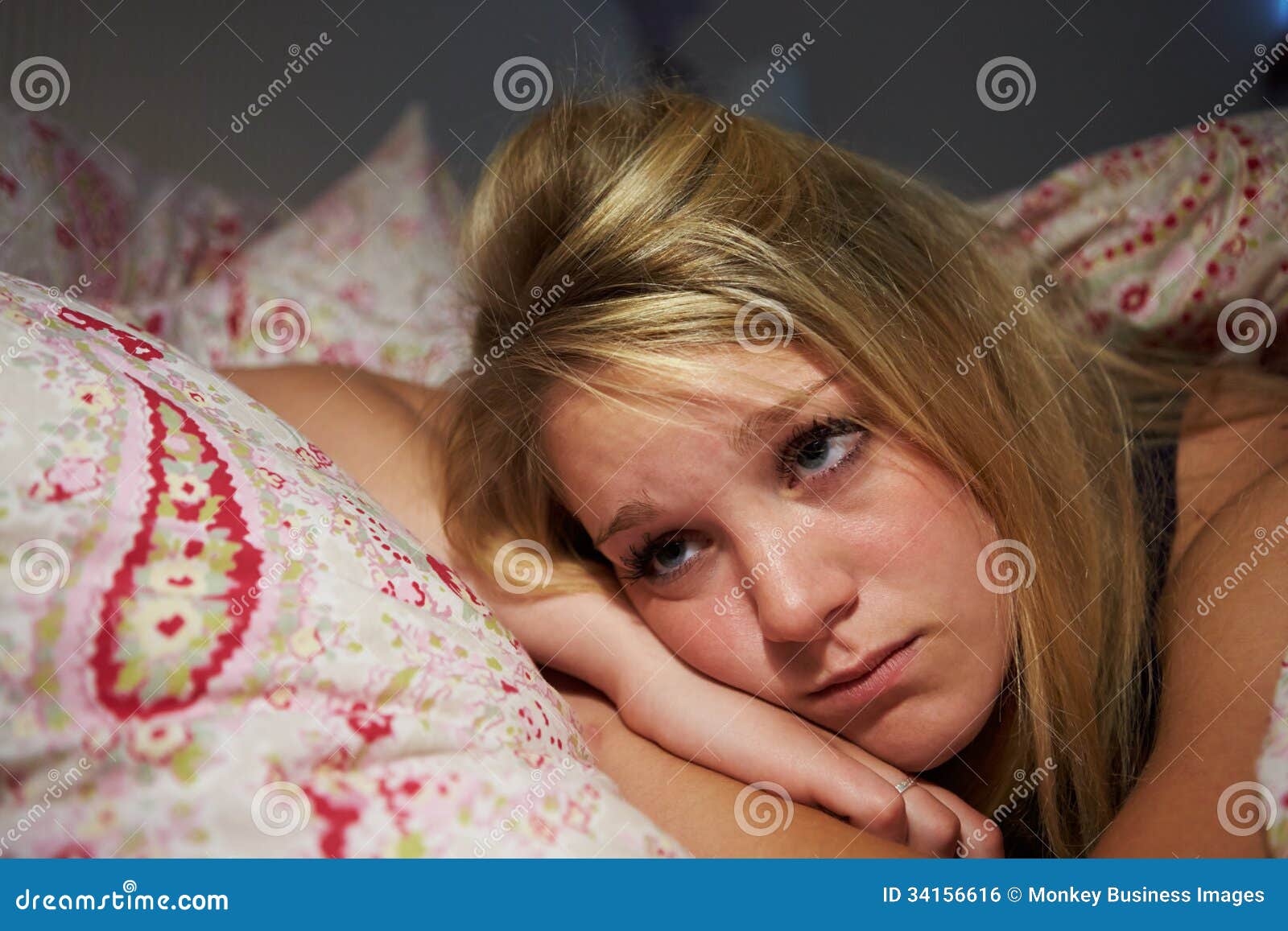 Teenage Girl Awake in Bed Suffering with Insomnia Stock Photo - Image ...