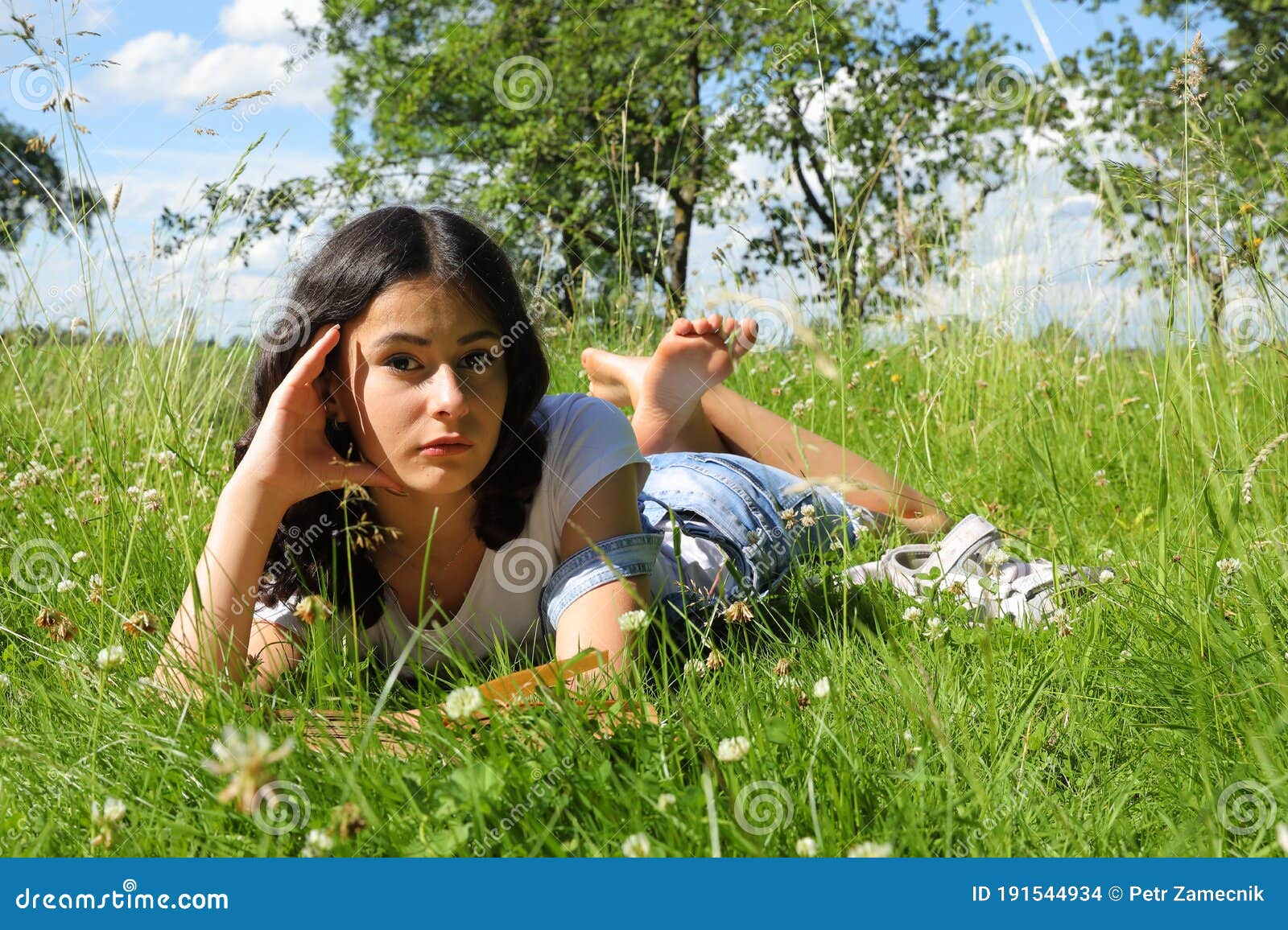 Barefoot Woman Laying Grass