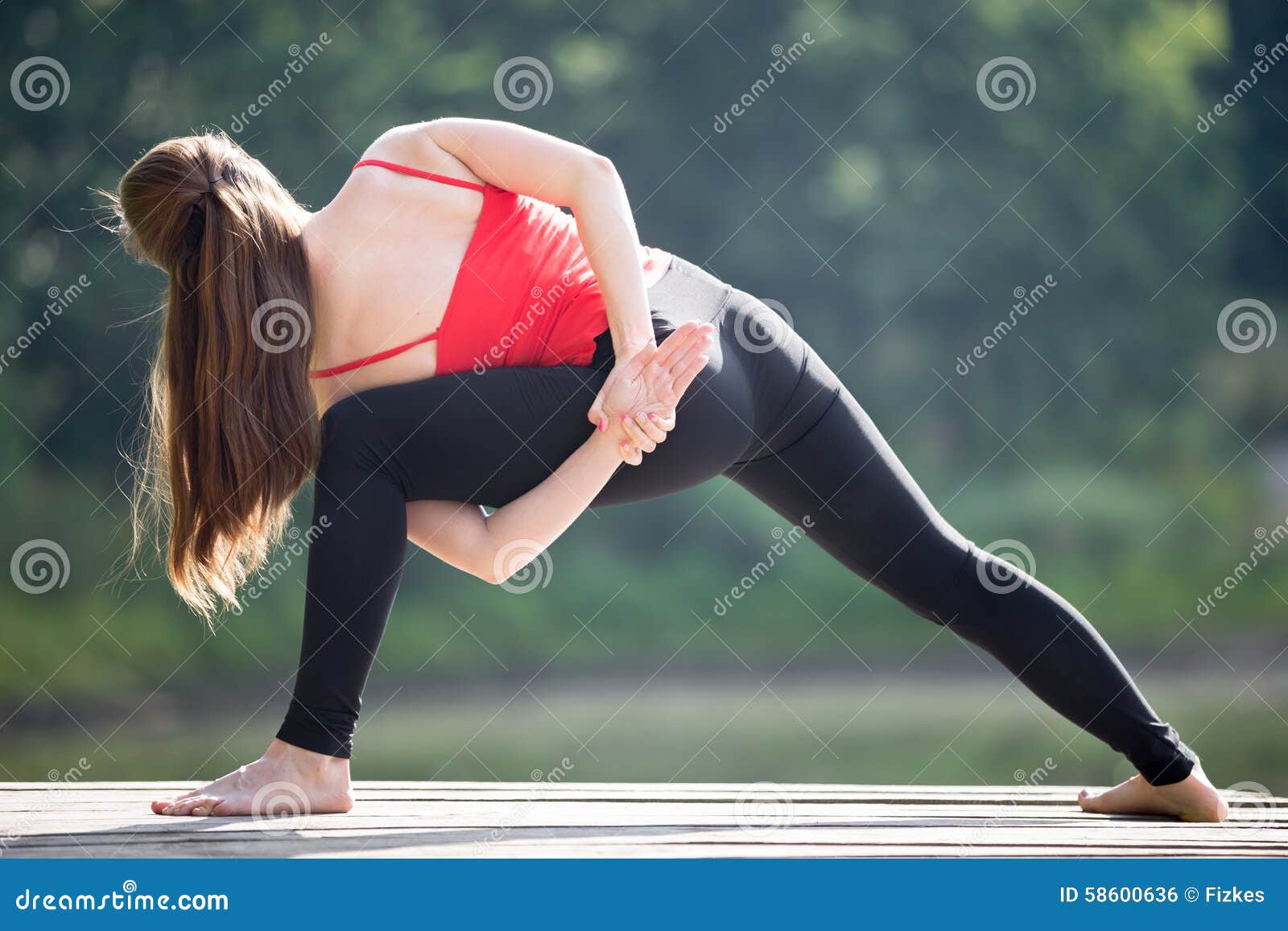 Teenage Girl Doing Revolved Side Angle Pose Stock Photo - Image of person,  parsvakonasana: 58600636