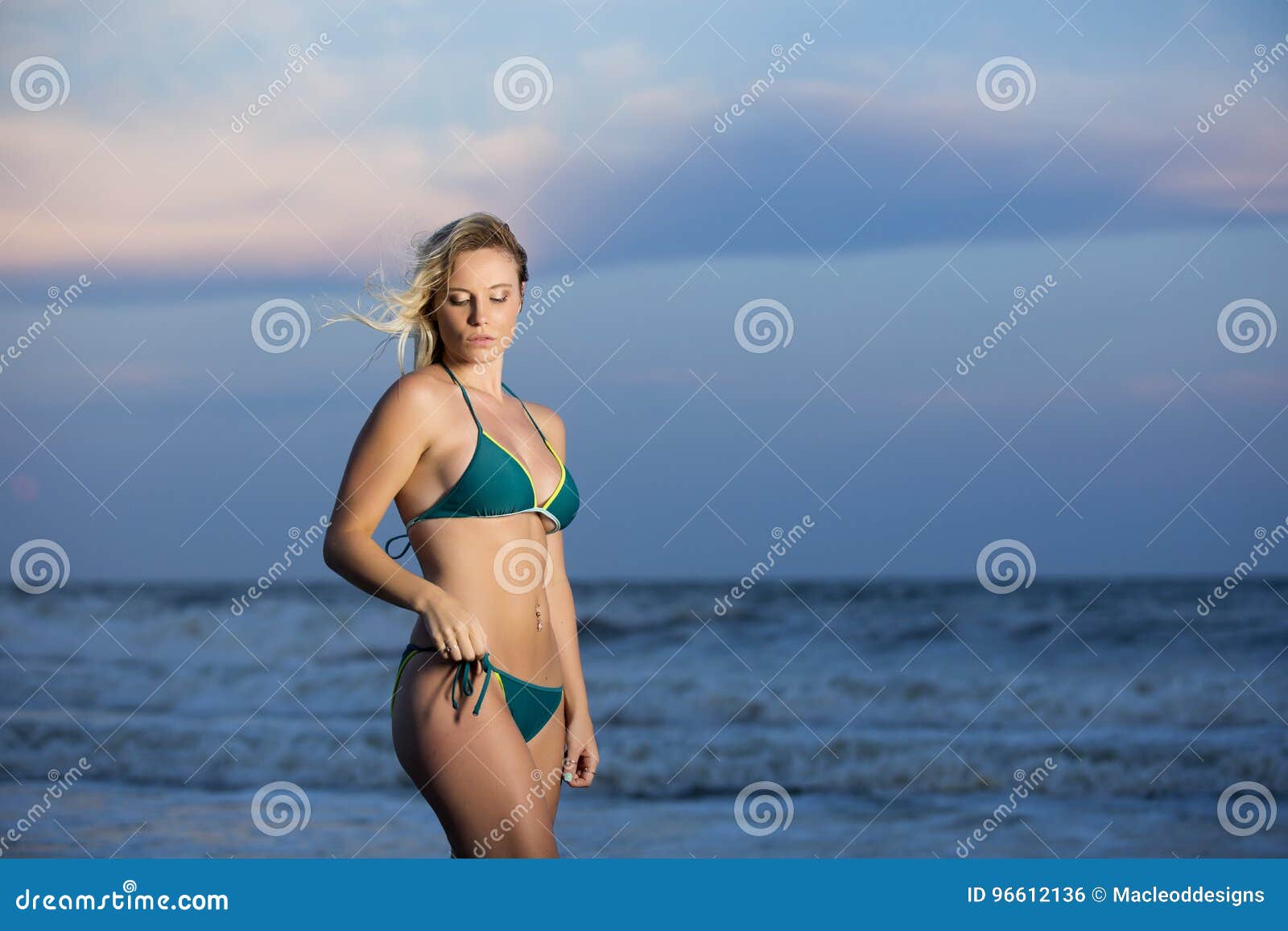 teenage girl in bikini in beach