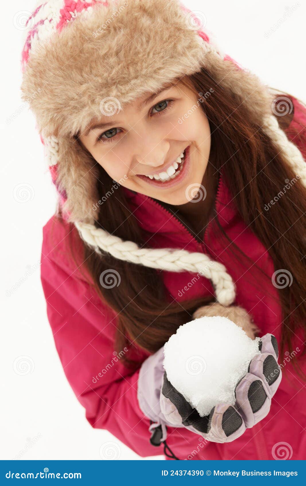 Teenage Girl Holding Snowball Wearing Fur Hat Stock Photo - Image of ...