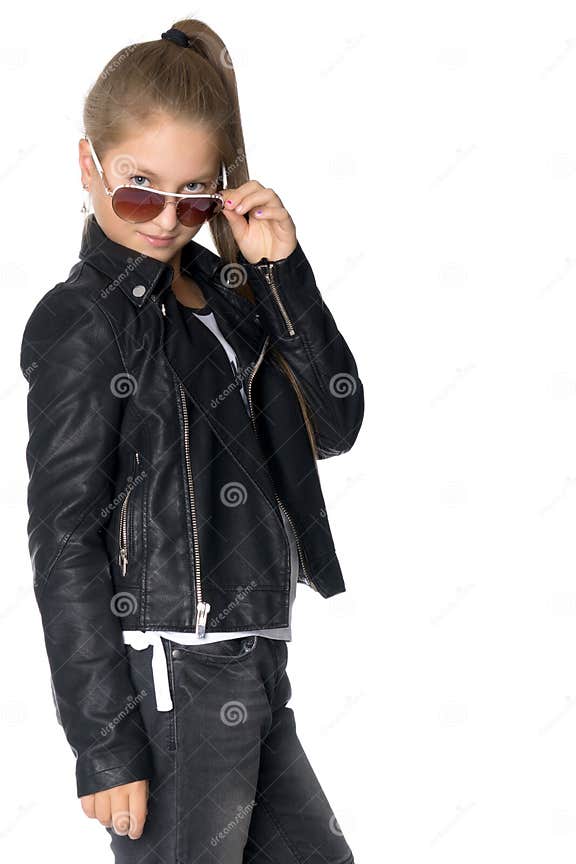 A Teenage Girl in a Leather Jacket and Glasses Stock Photo - Image of ...