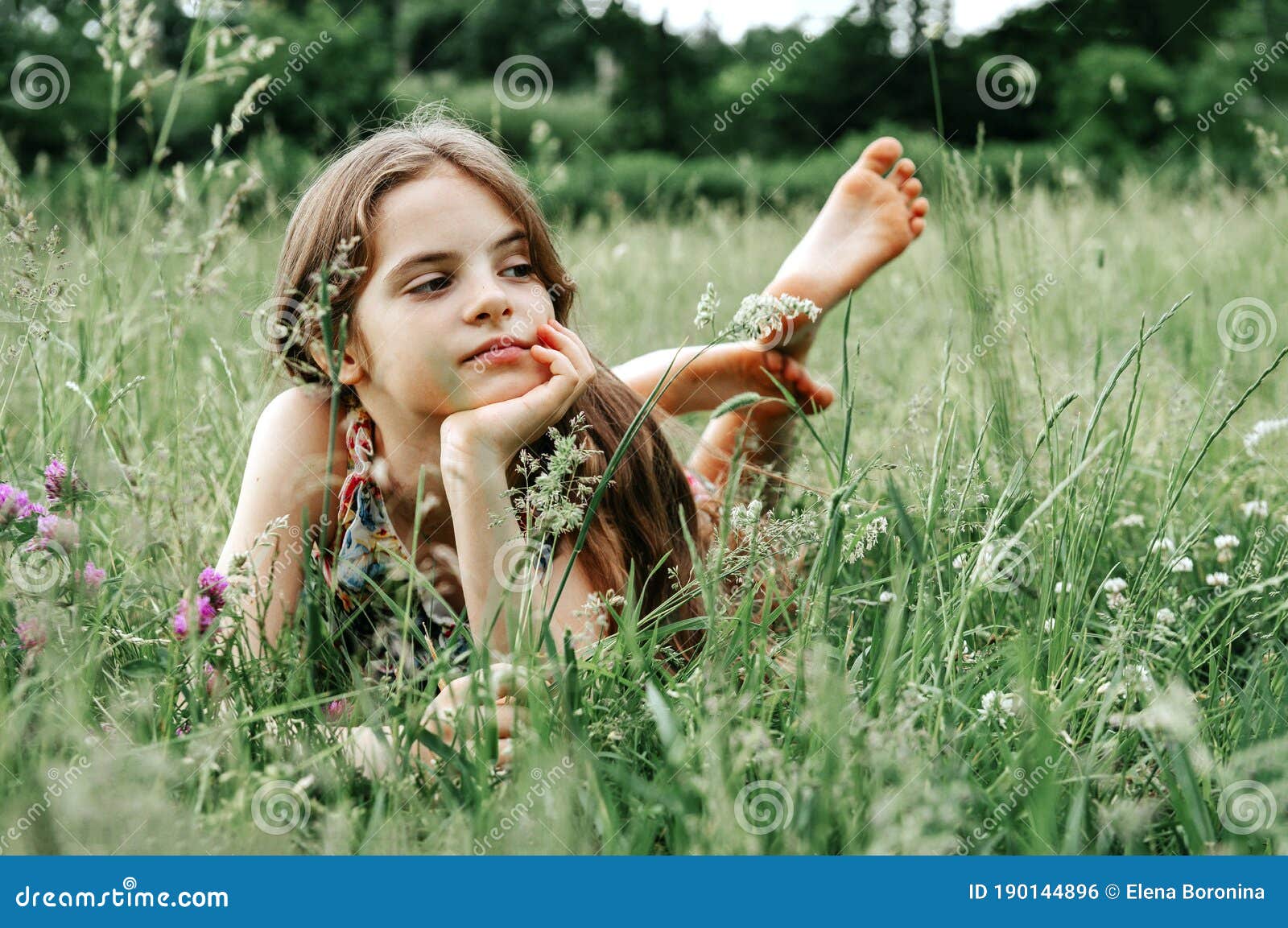 Barefoot Woman Laying Grass