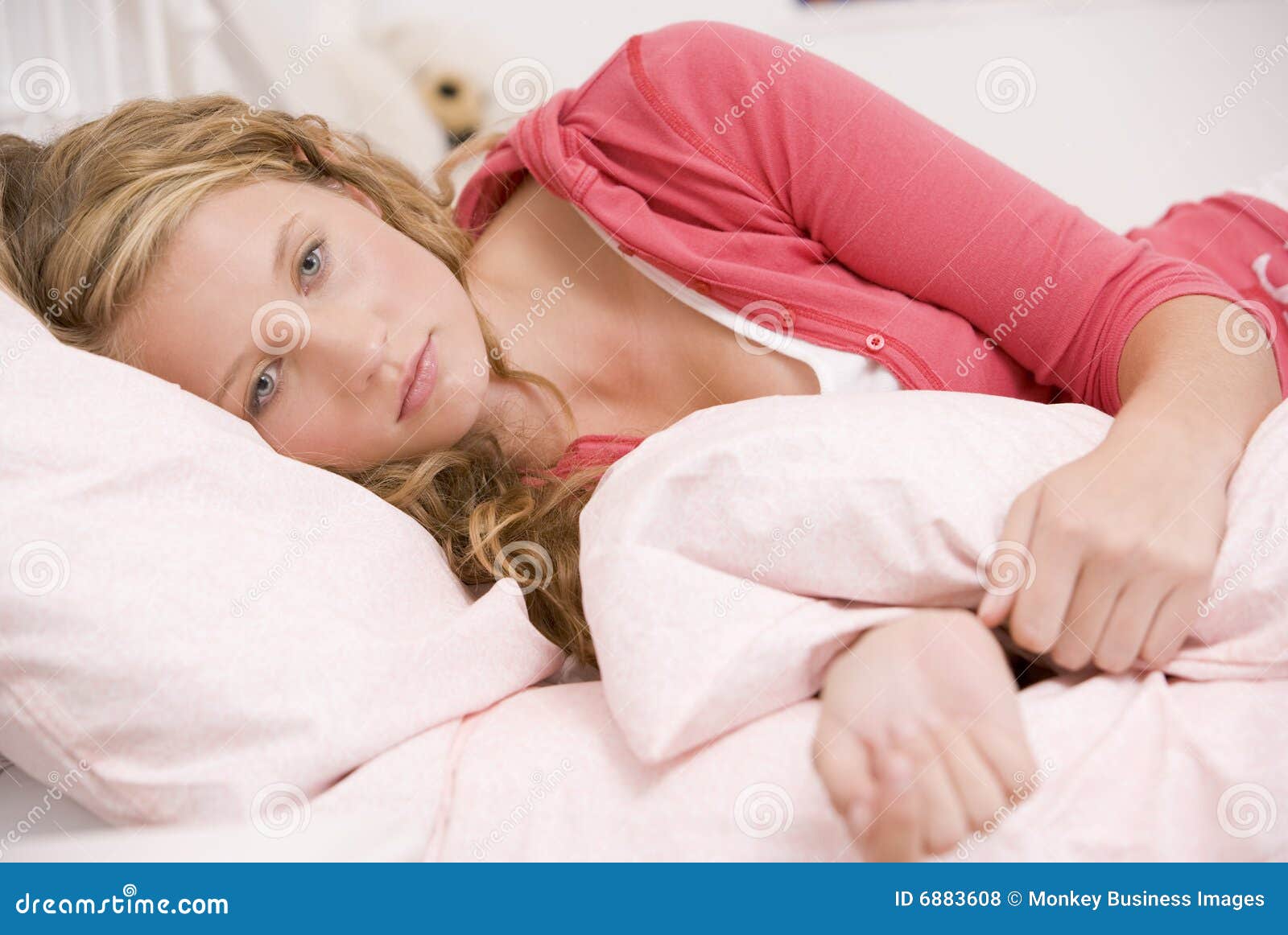 Teenage Girl Lying On Her Bed Looking Sick Royalty Free Stock Photos 