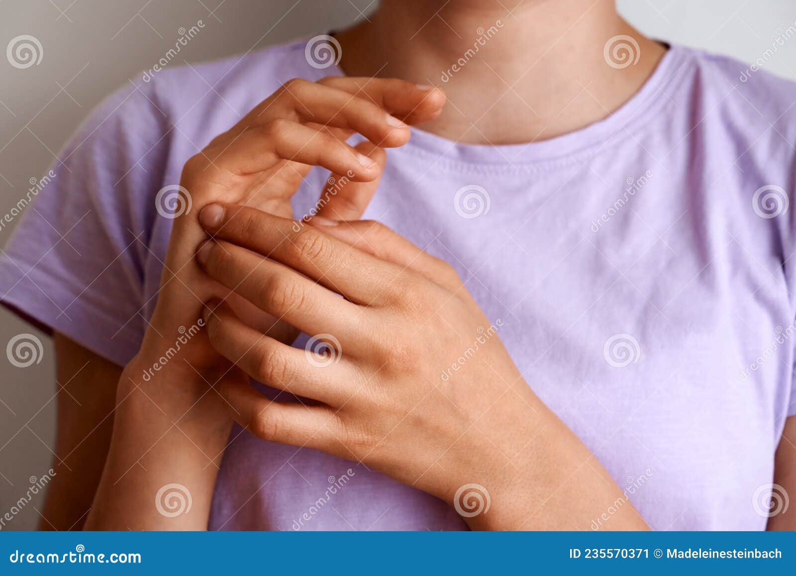 teenage girl practicing eft tapping or emotional freedom technique