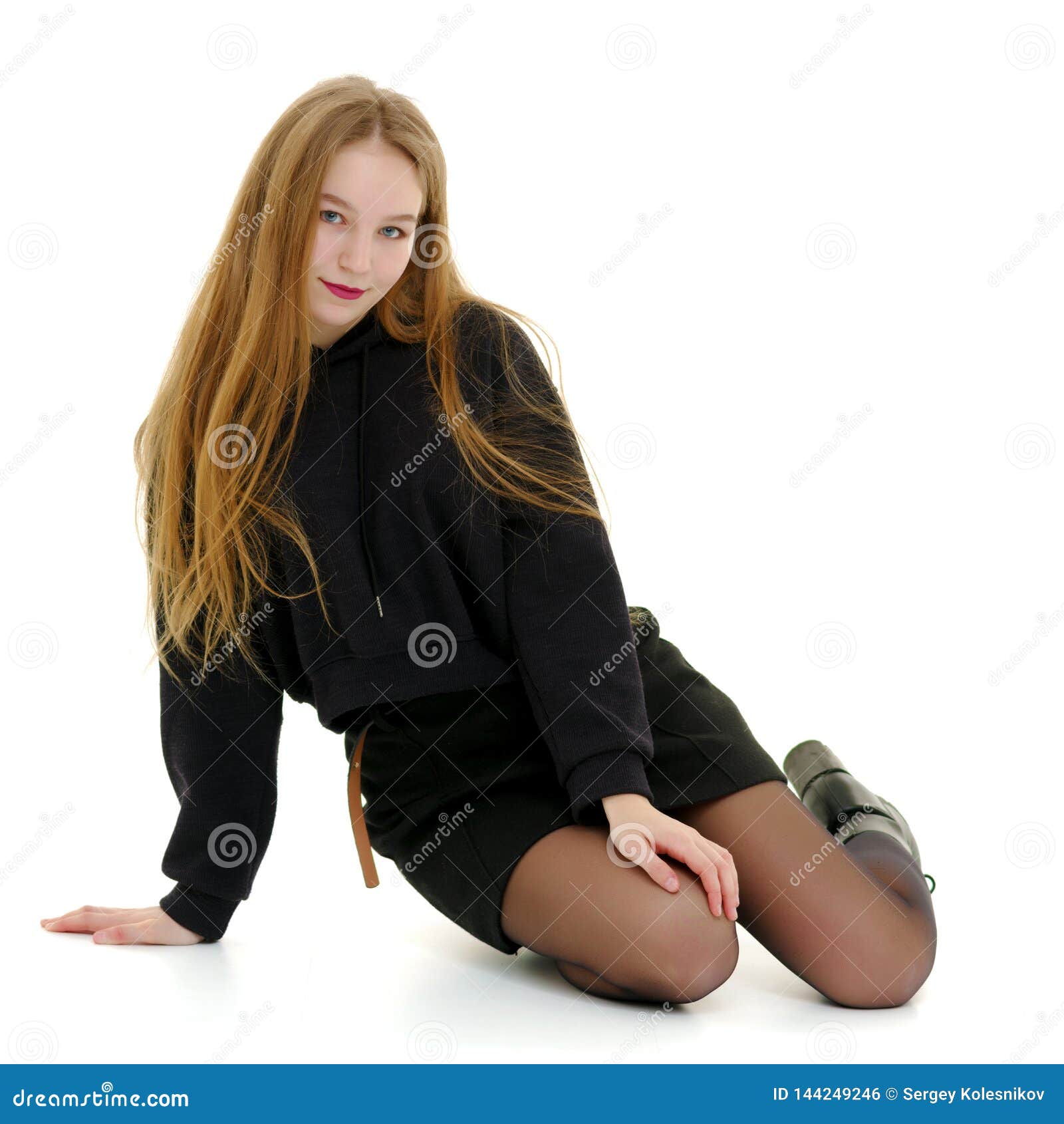 A Teenage Girl is Sitting on the Floor. Stock Photo - Image of fashion ...