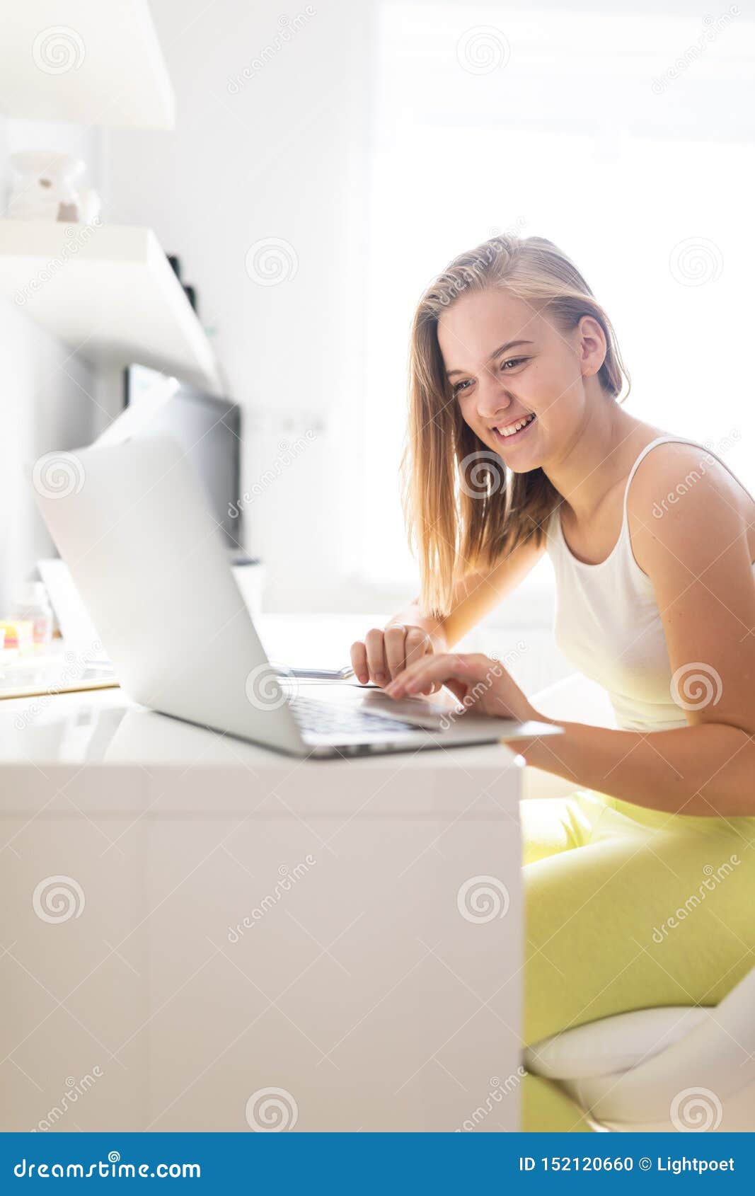 teenage girl studing for school, doing homework