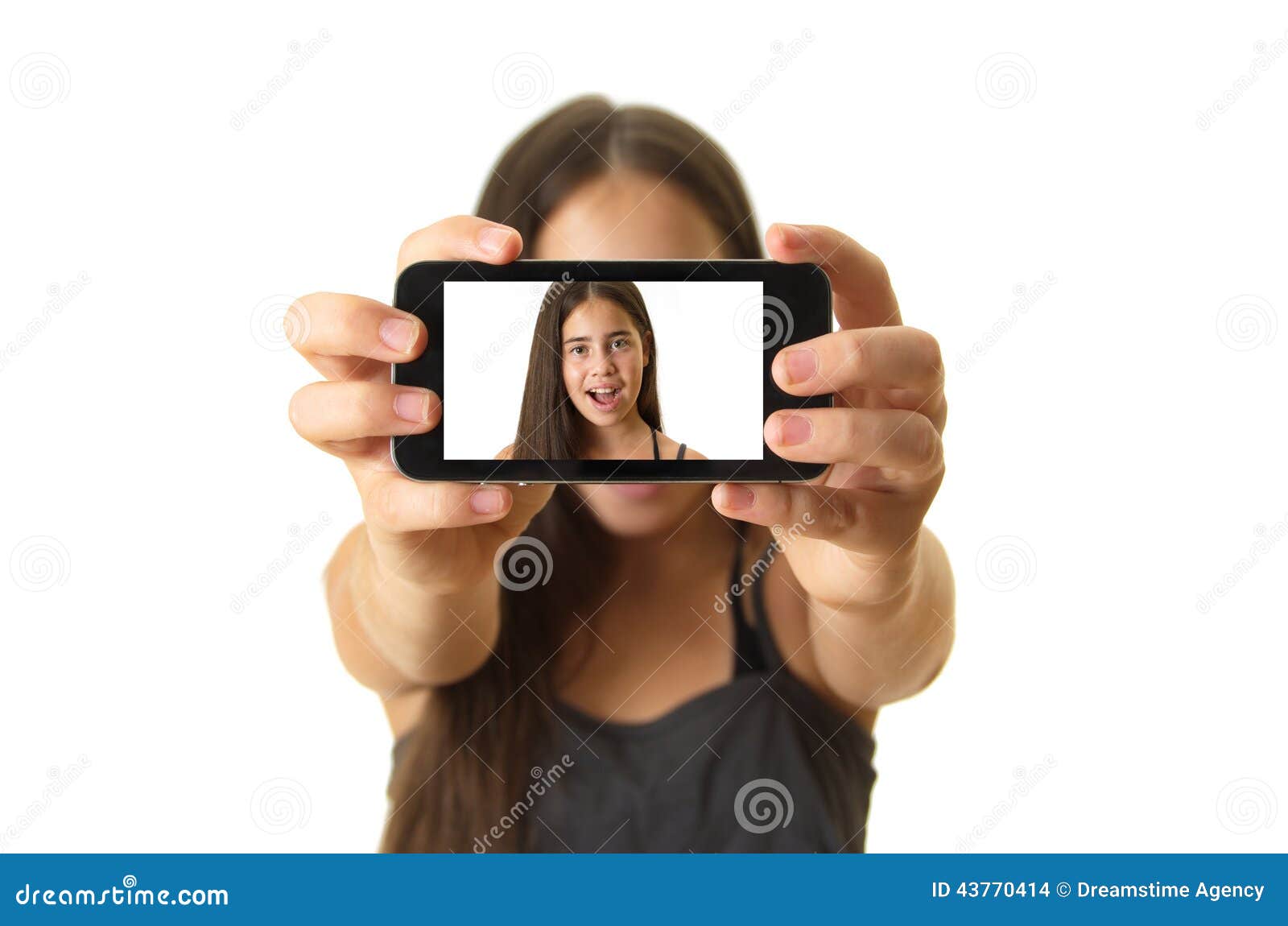 teenage girl taking a selfie