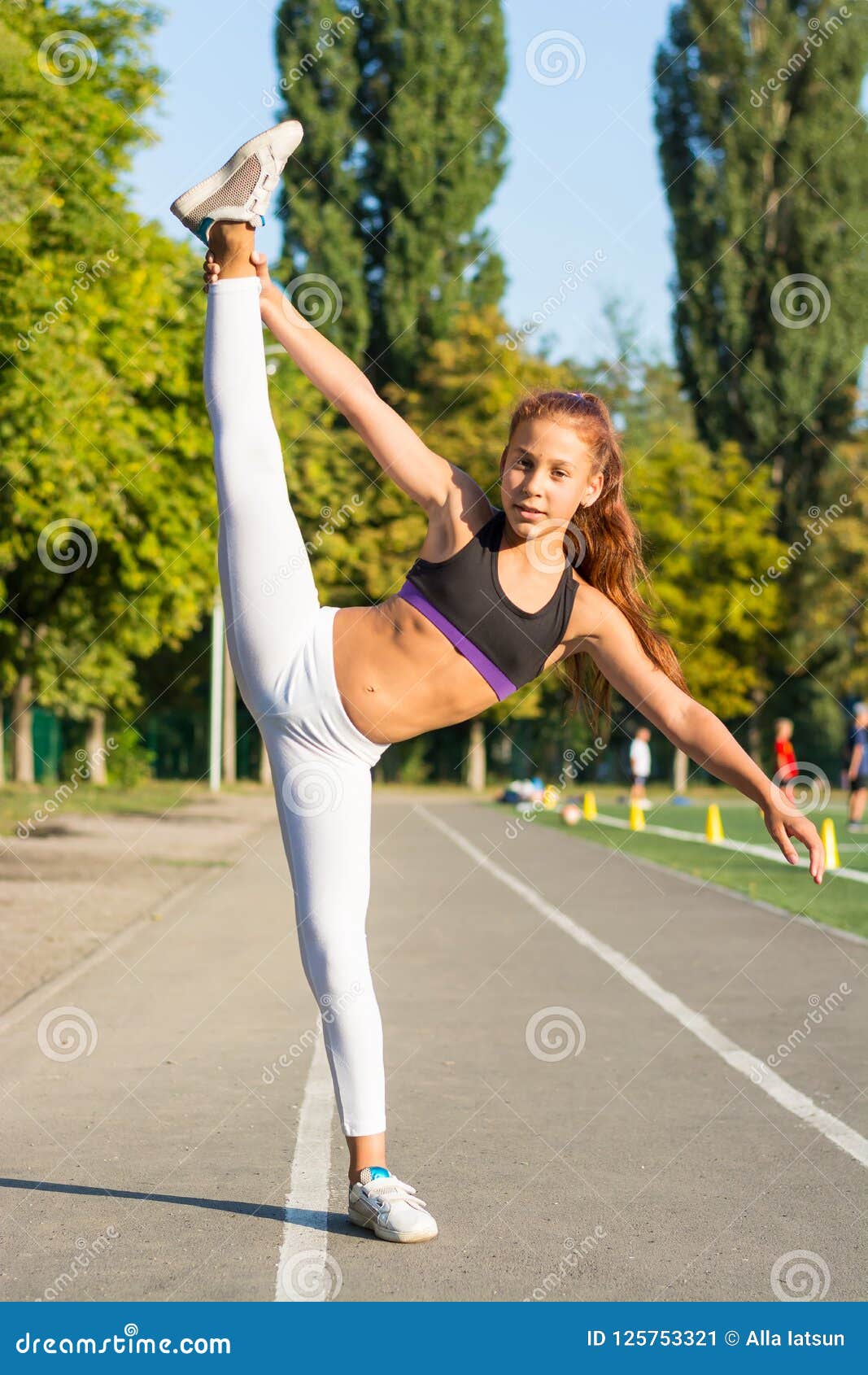 Teenage Girl Is Training At The Stadium Doing Stretching On The Stock Image Image Of