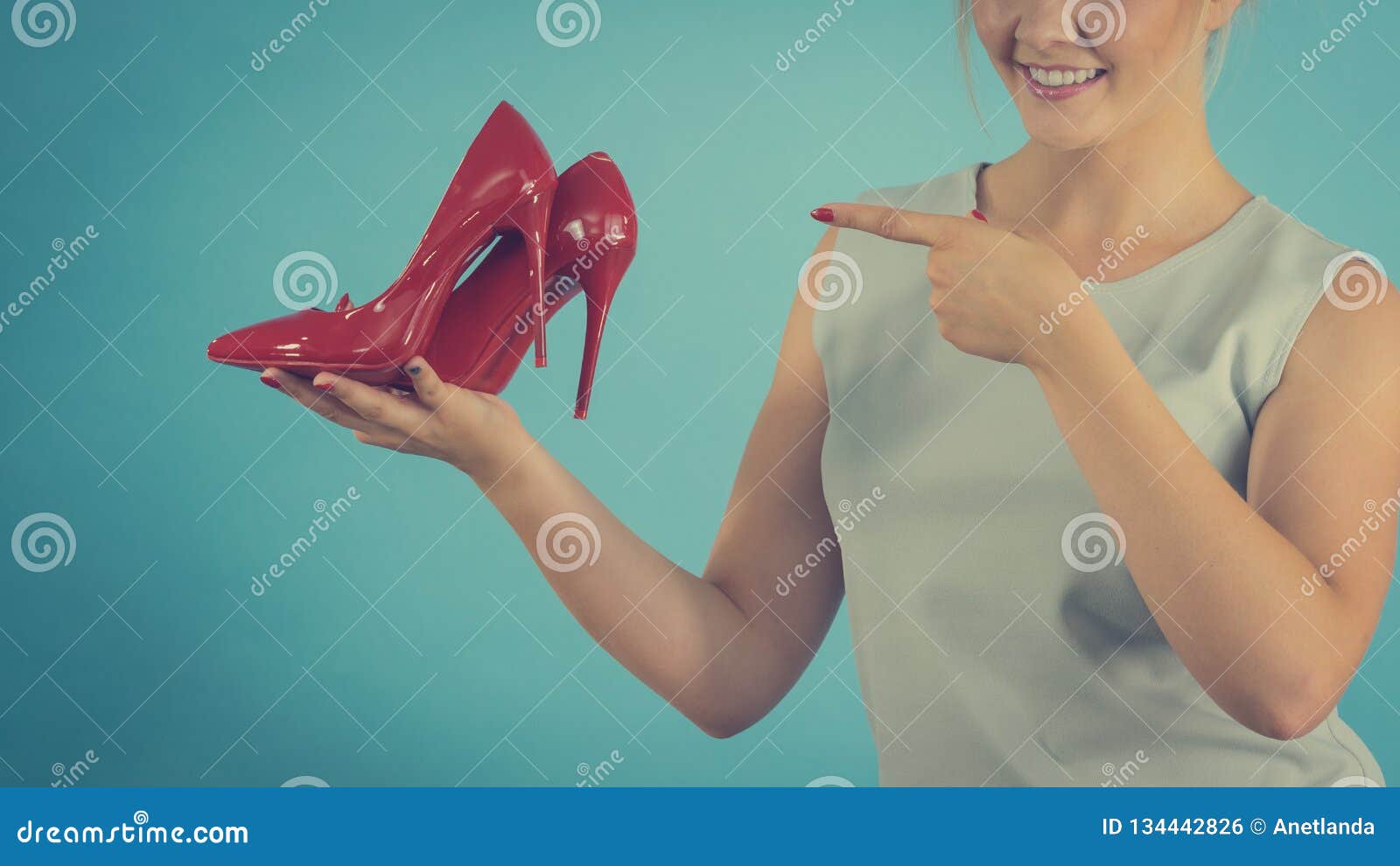 Fashion Stylist Presenting High Heels Stock Photo Image Of Beautiful