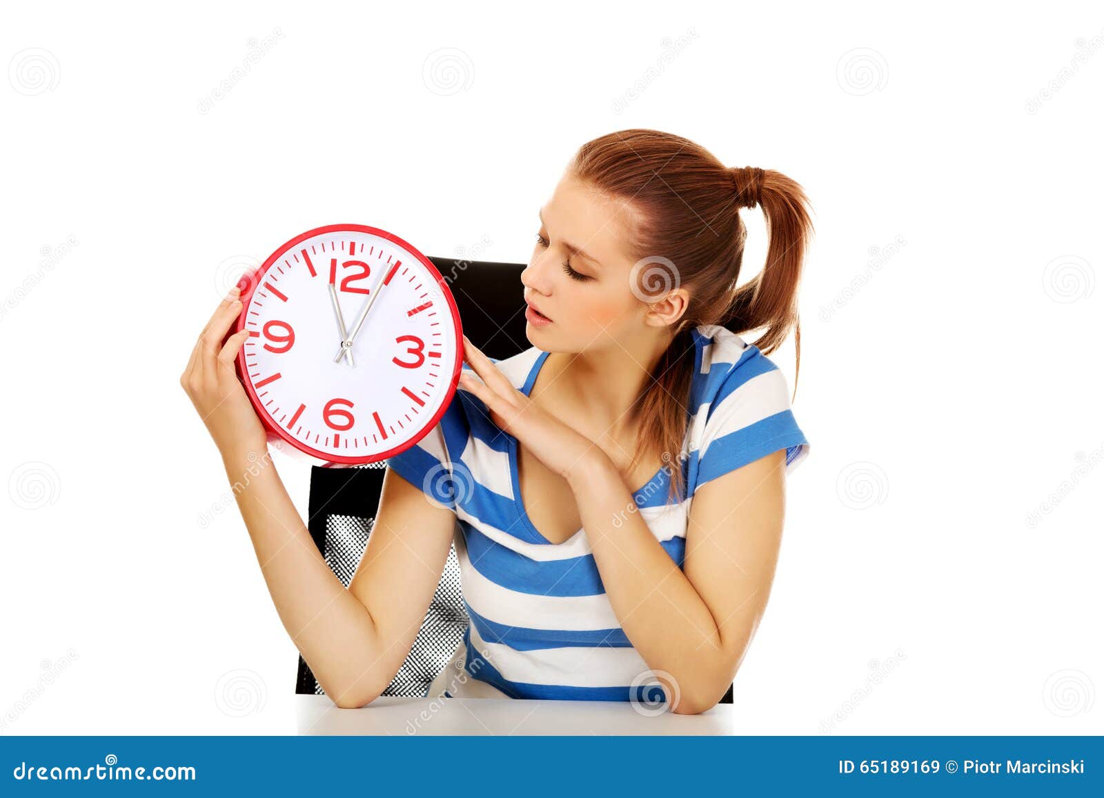 Teenage Woman Looking at Clock Stock Image Image of late, holding