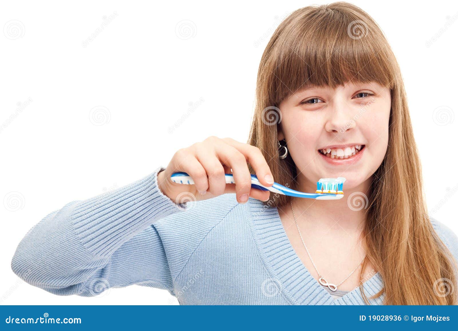 teenager brushing teeth