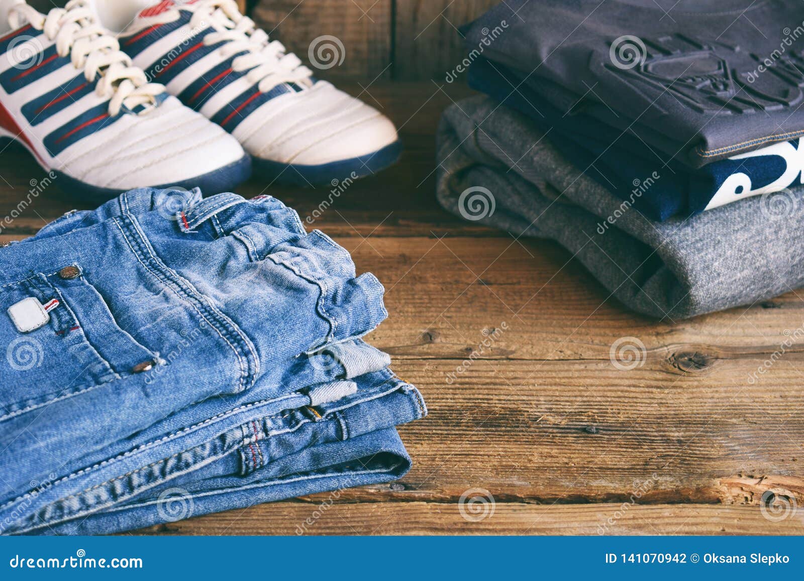 Teenager Casual Outfit. Boys Shoes, Clothing And Accessories On Wooden ...