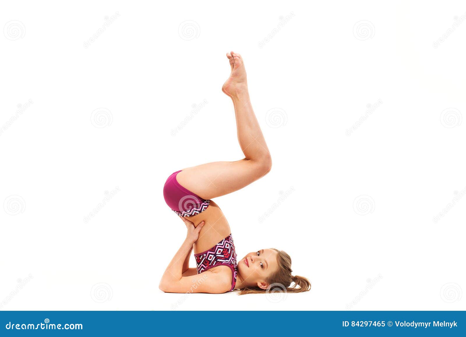 Little girl doing gymnastics with hoop, ball and split isolated on grey  background, studio Stock Photo - Alamy