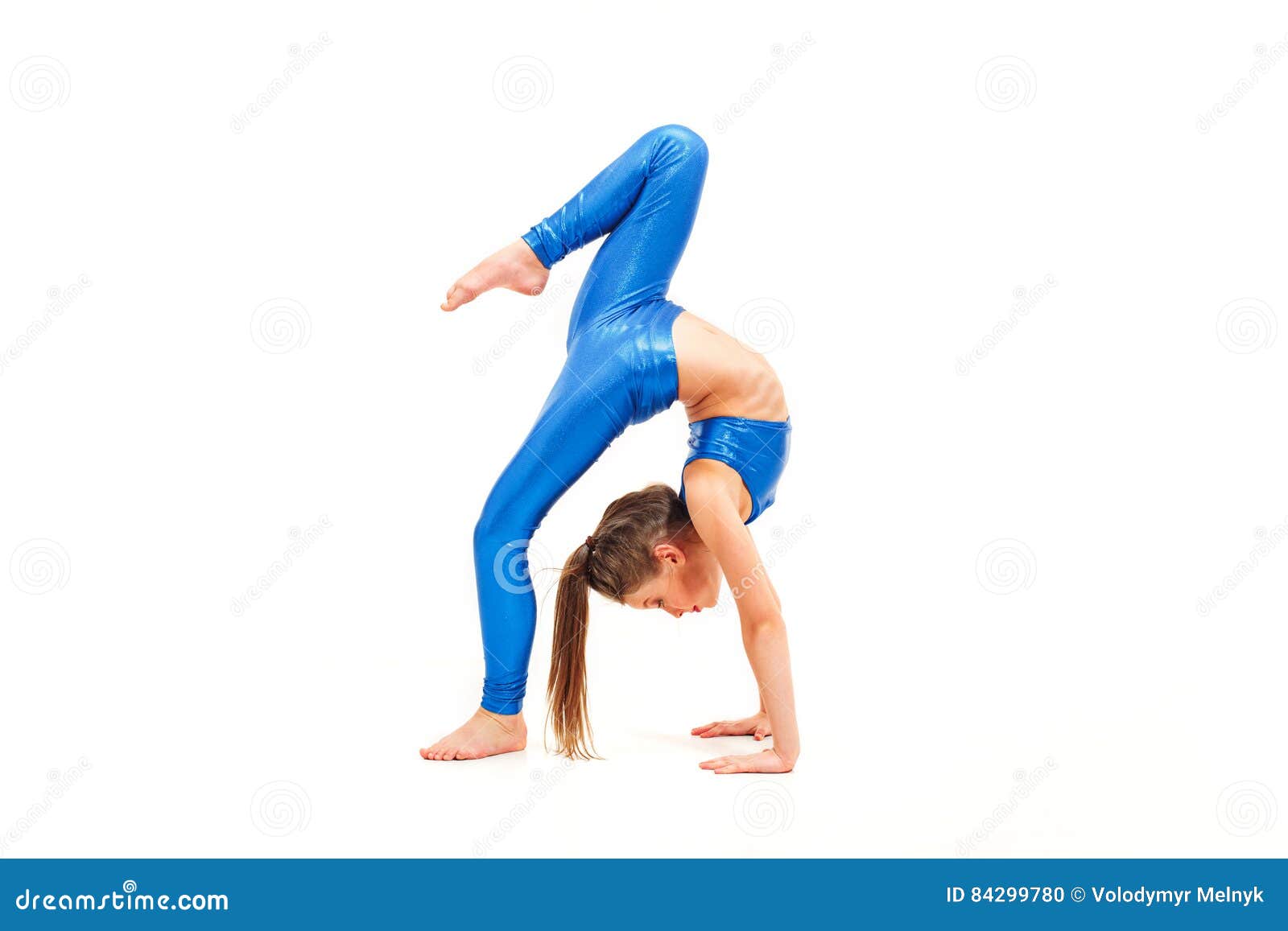 The Teenager Girl Doing Gymnastics Exercises Isolated on White ...