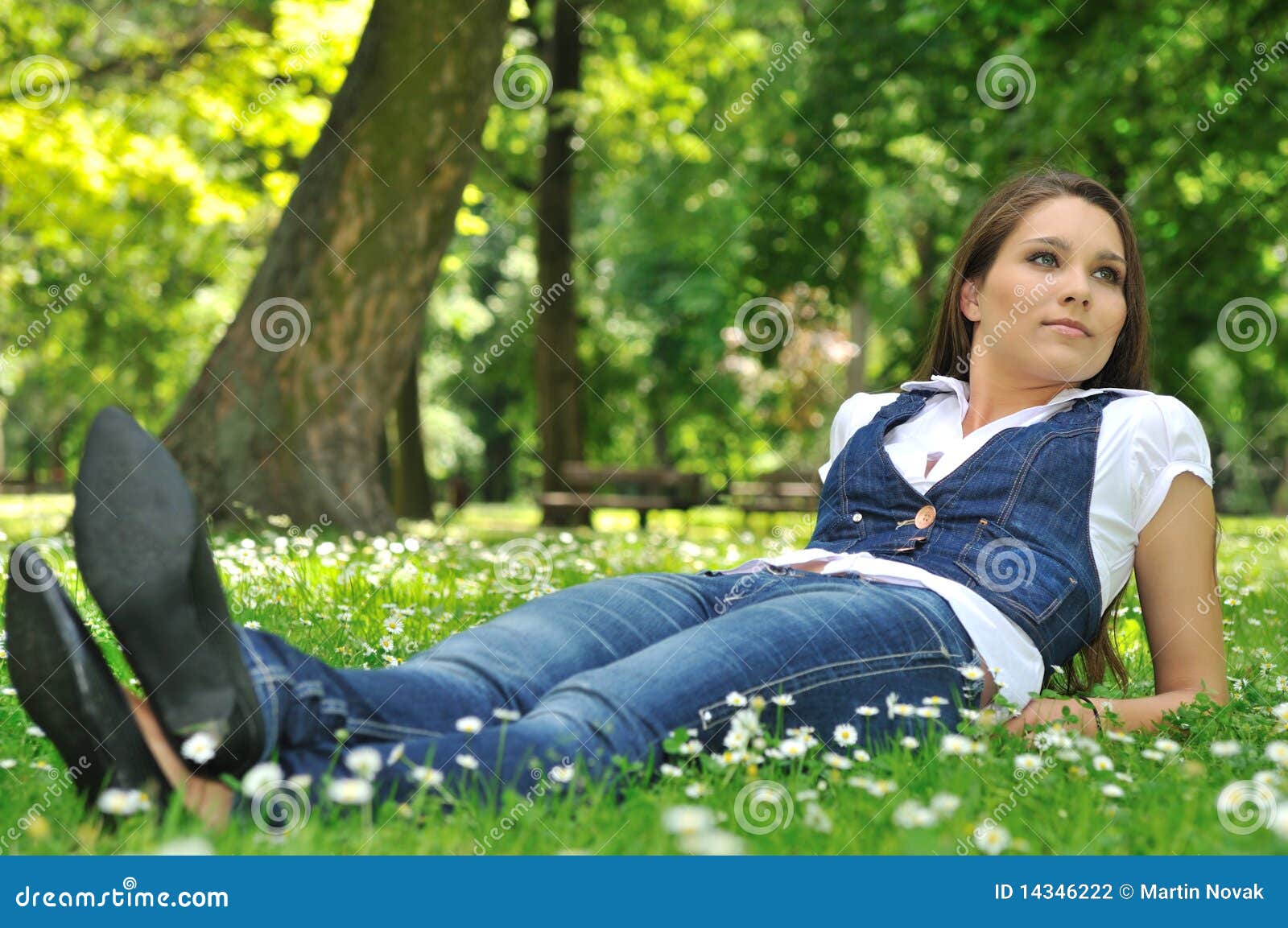 Teenager lying in grass stock photo. Image of lying, lawn - 14346222