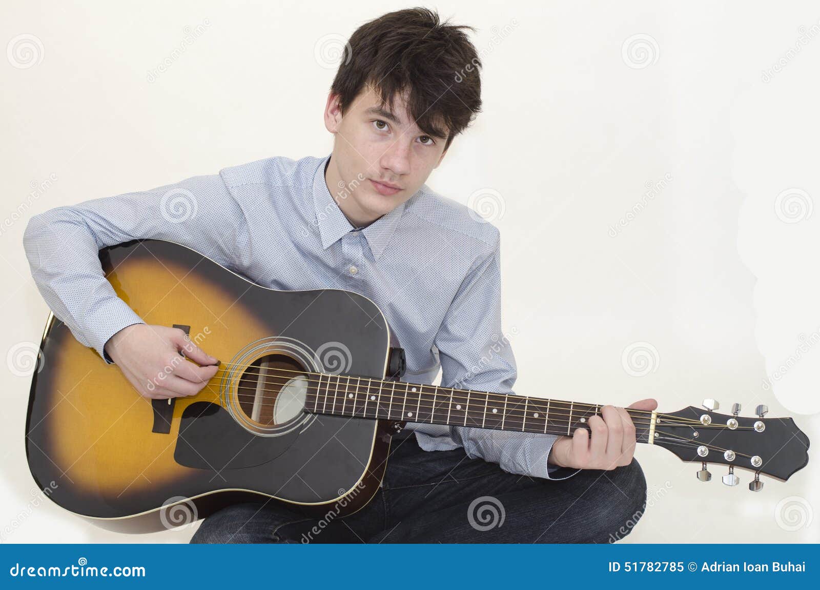 Teenager playing guitar stock image. Image of white, guitar 51782785