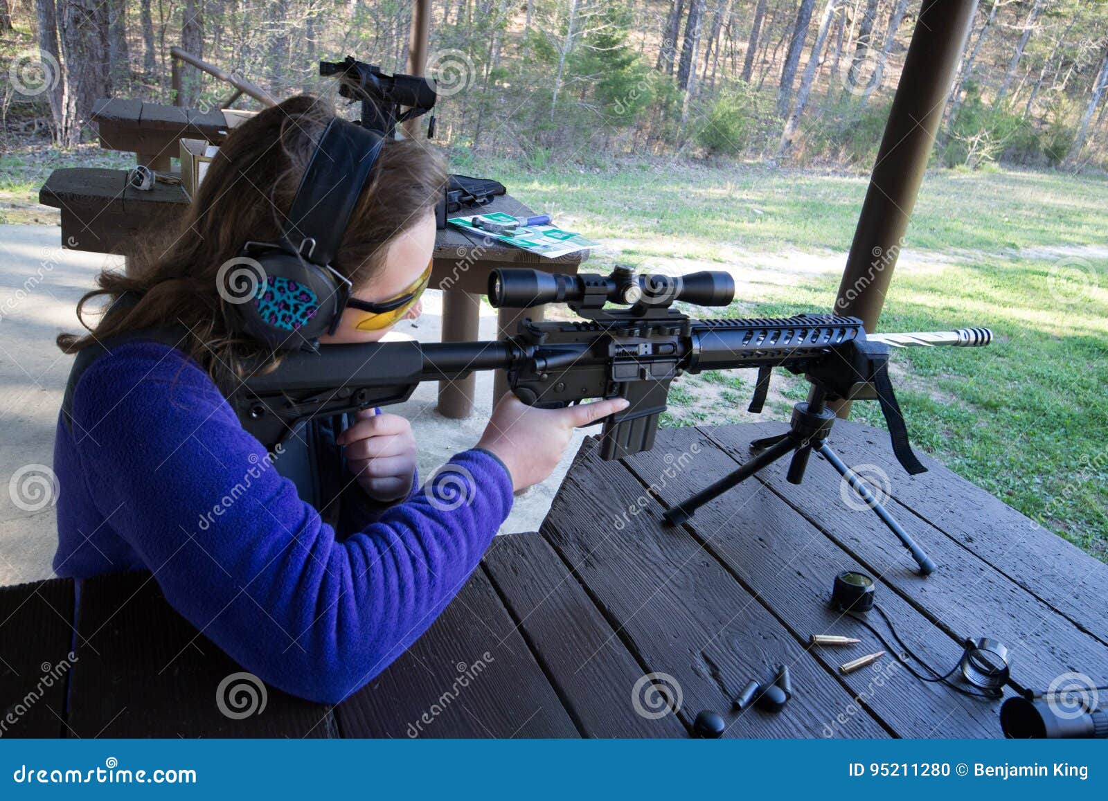 teenager at shooting range