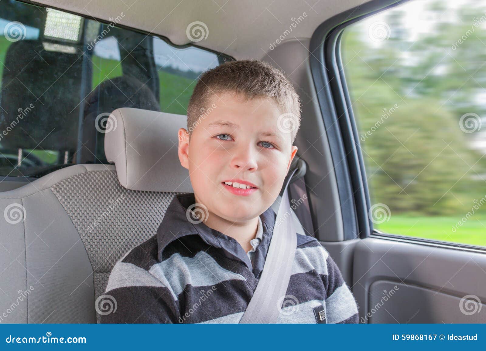 Teenager Sitting In A Car In Safety Chair Stock Image ...