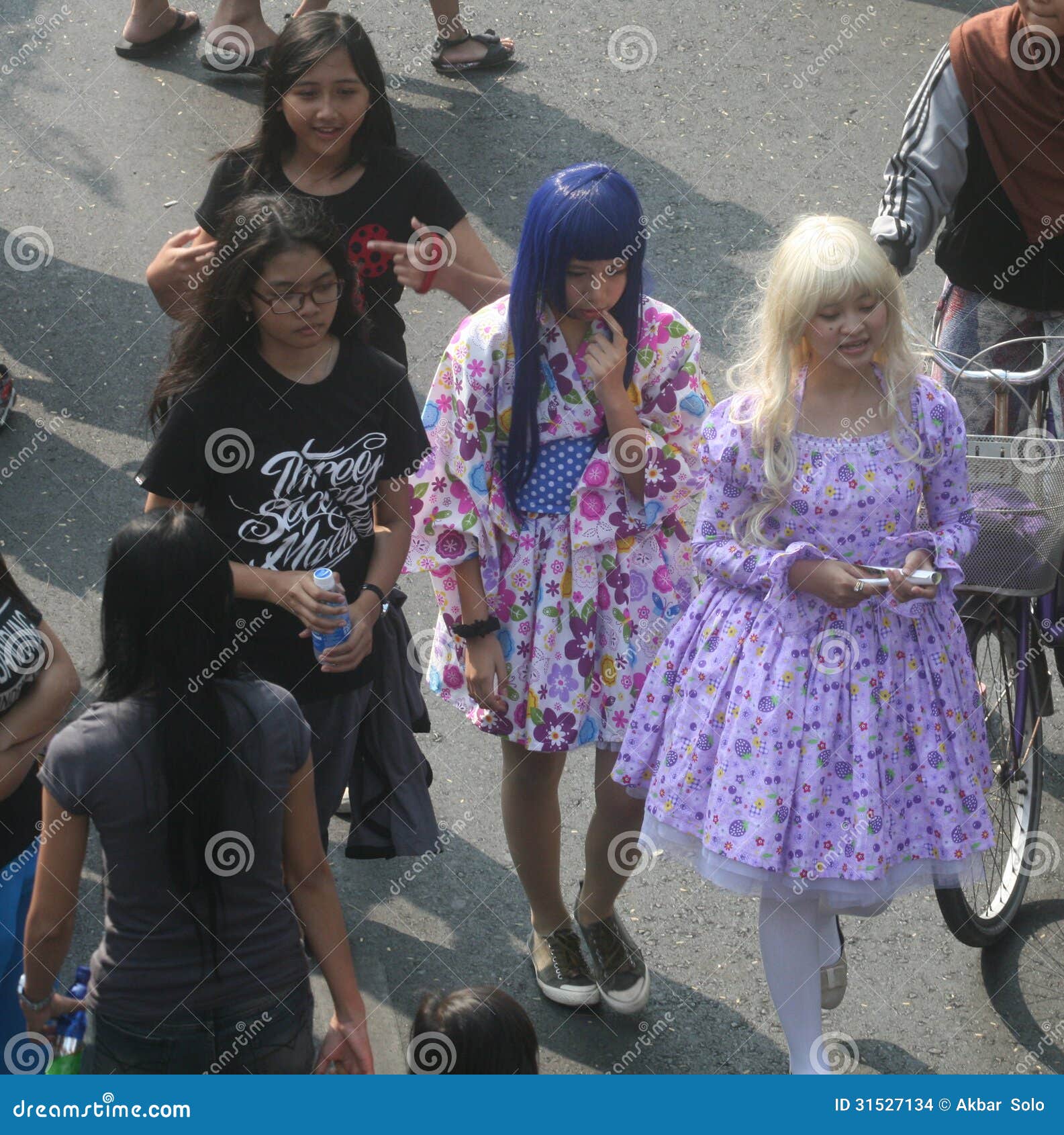 Teenager wearing cosplay costume in the street, Solo, Central Java, Indonesia