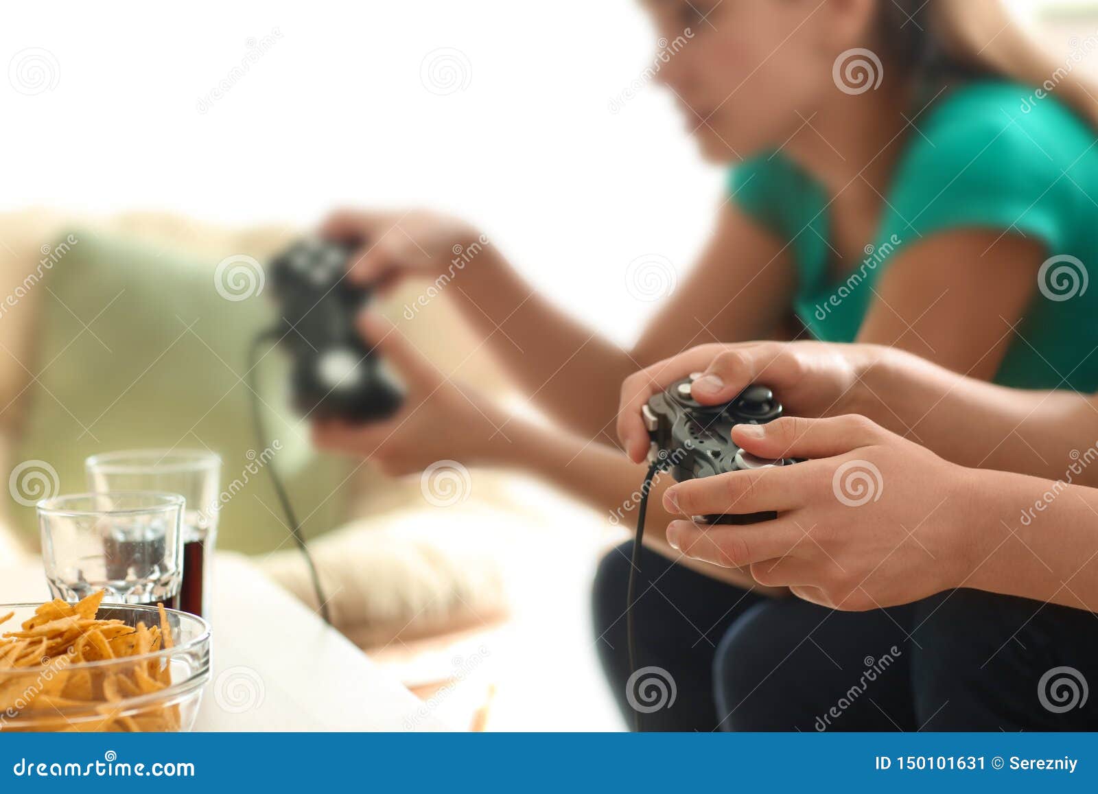 Teenagers Playing Video Games at Home Stock Image Image of home