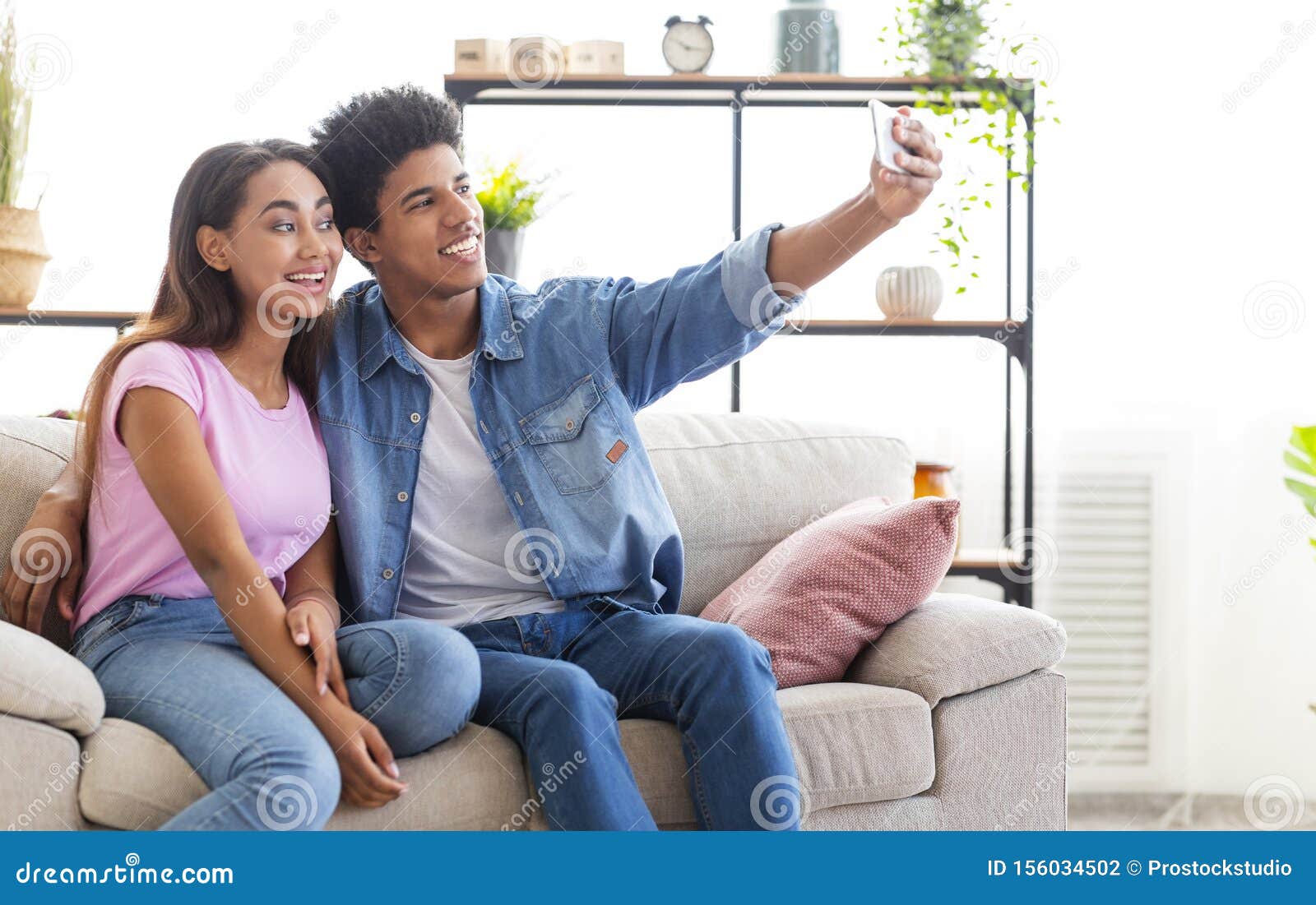 Teenagers Taking Selfie And Having Fun At Home Stock Photo Image