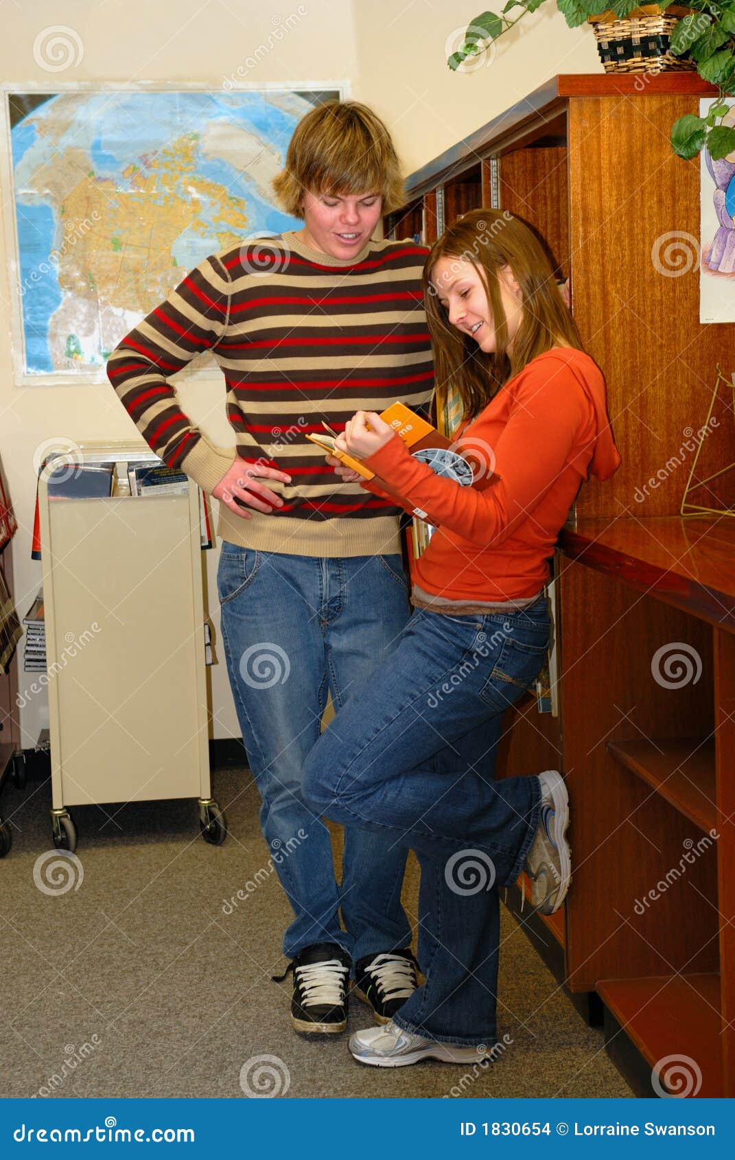 Teens flirting in Library stock photo amateur Sex Pic Hd Teens flirting in Library stock photo