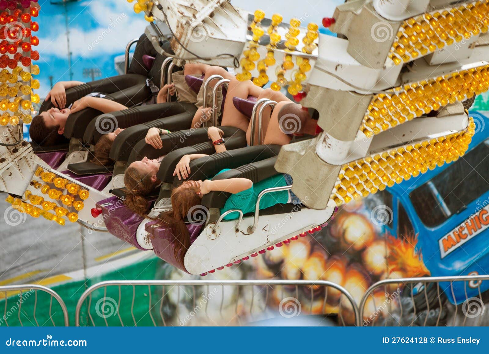 Teens Have Fun On Exciting Carnival Ride Editorial Stock