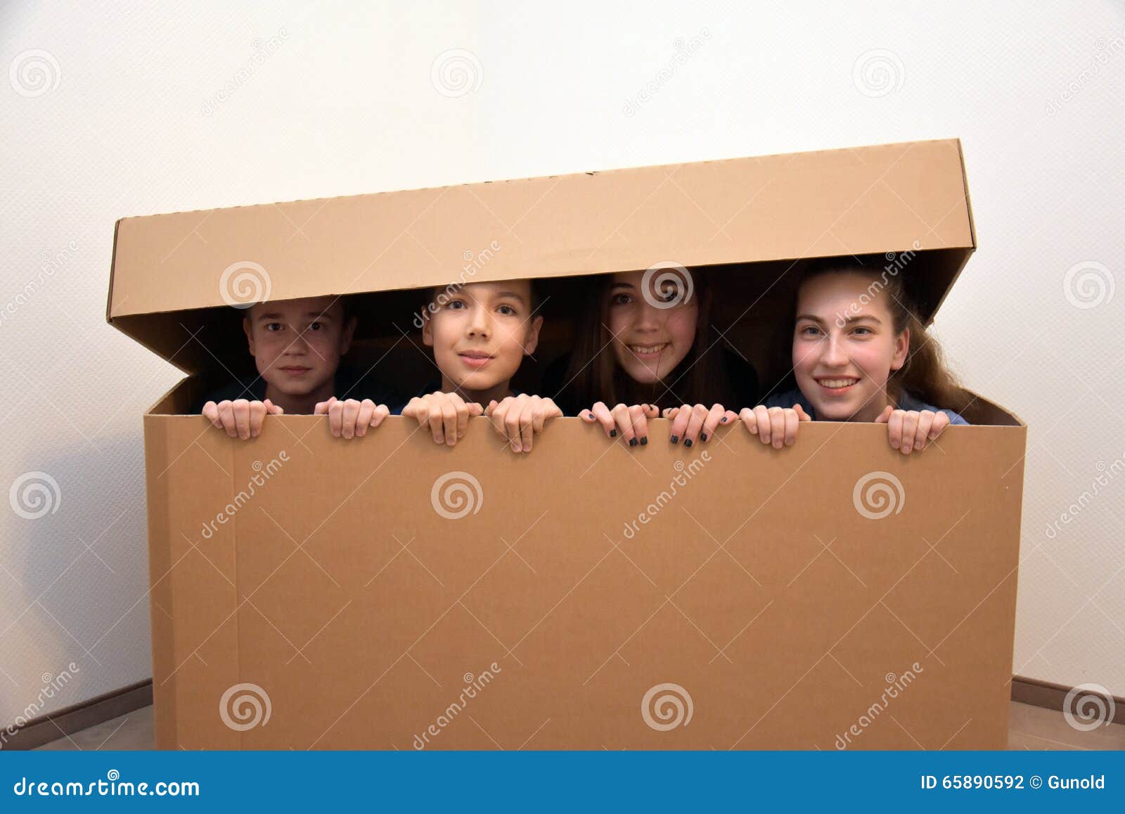 teens hidden in moving box