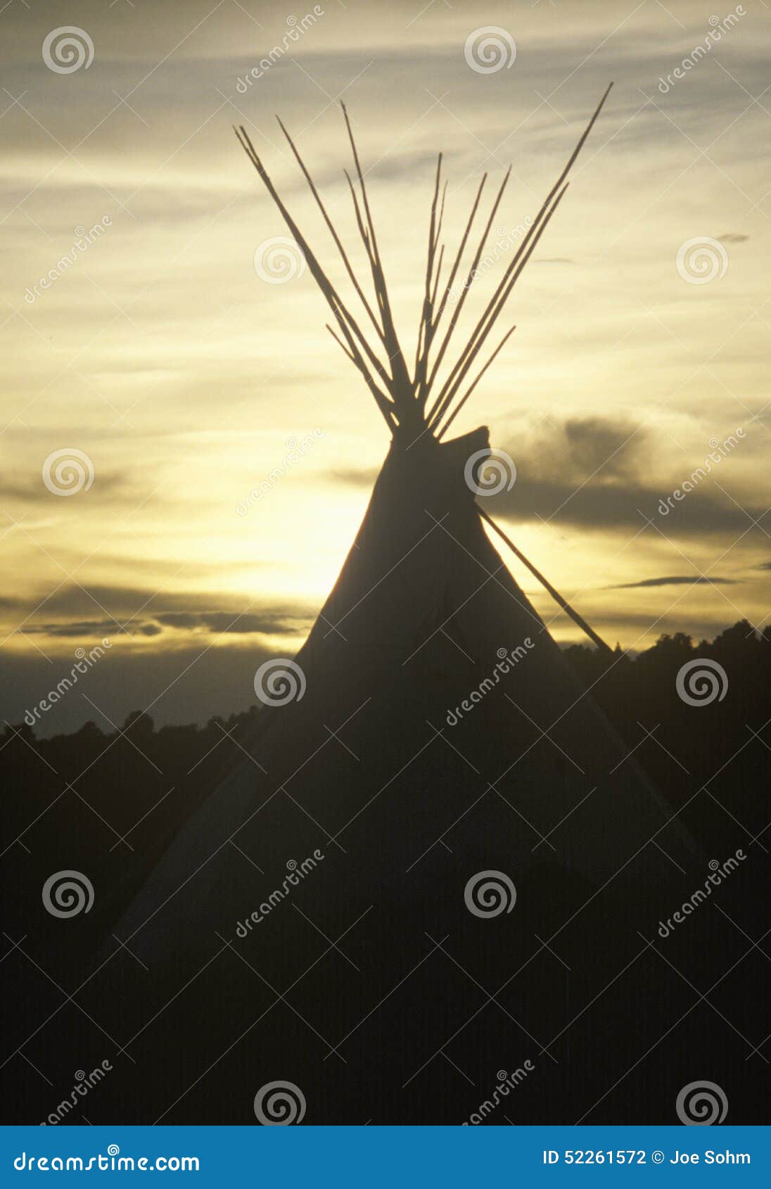 teepee silhouetted at dusk in taos, nm