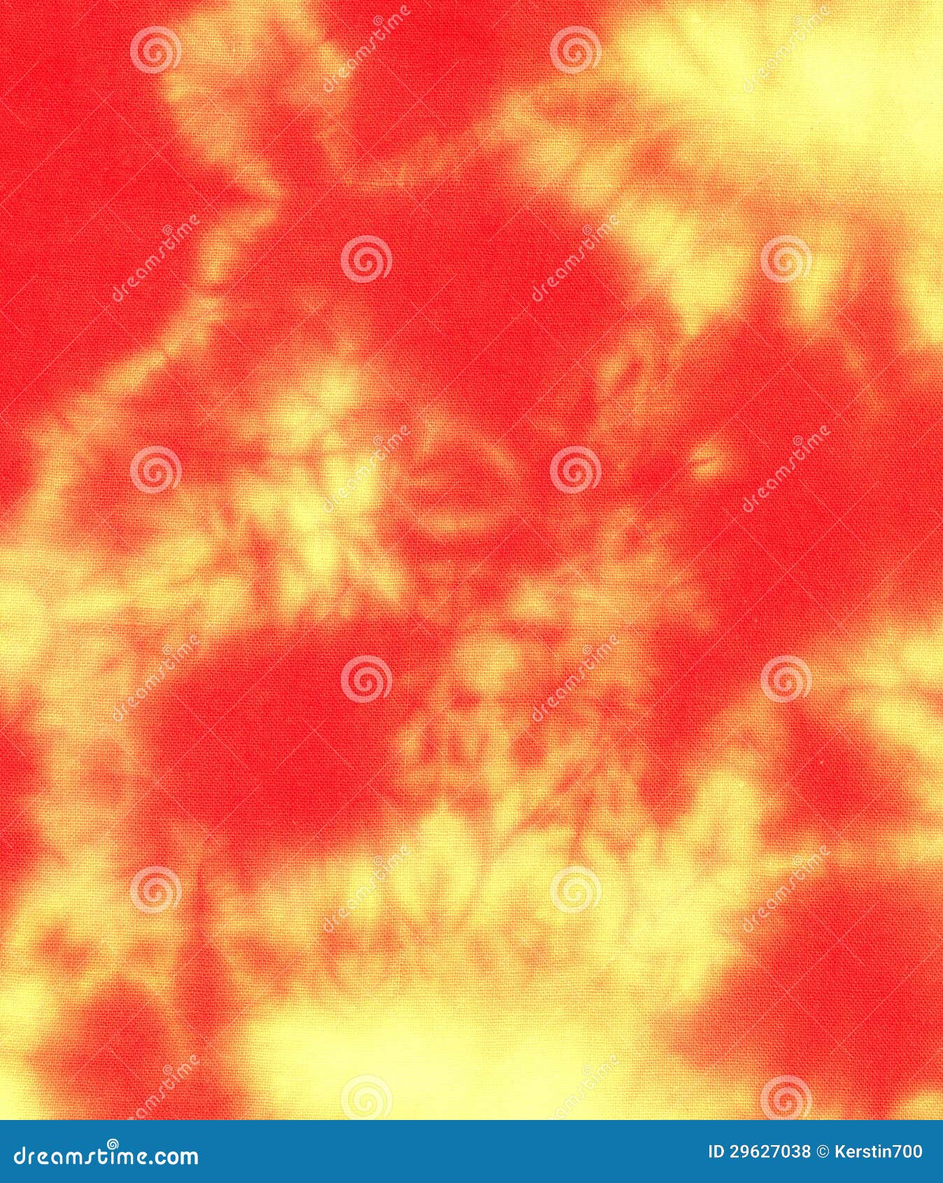 Tekstylny tło - Batikowy wzór w kolor żółty i czerwieni