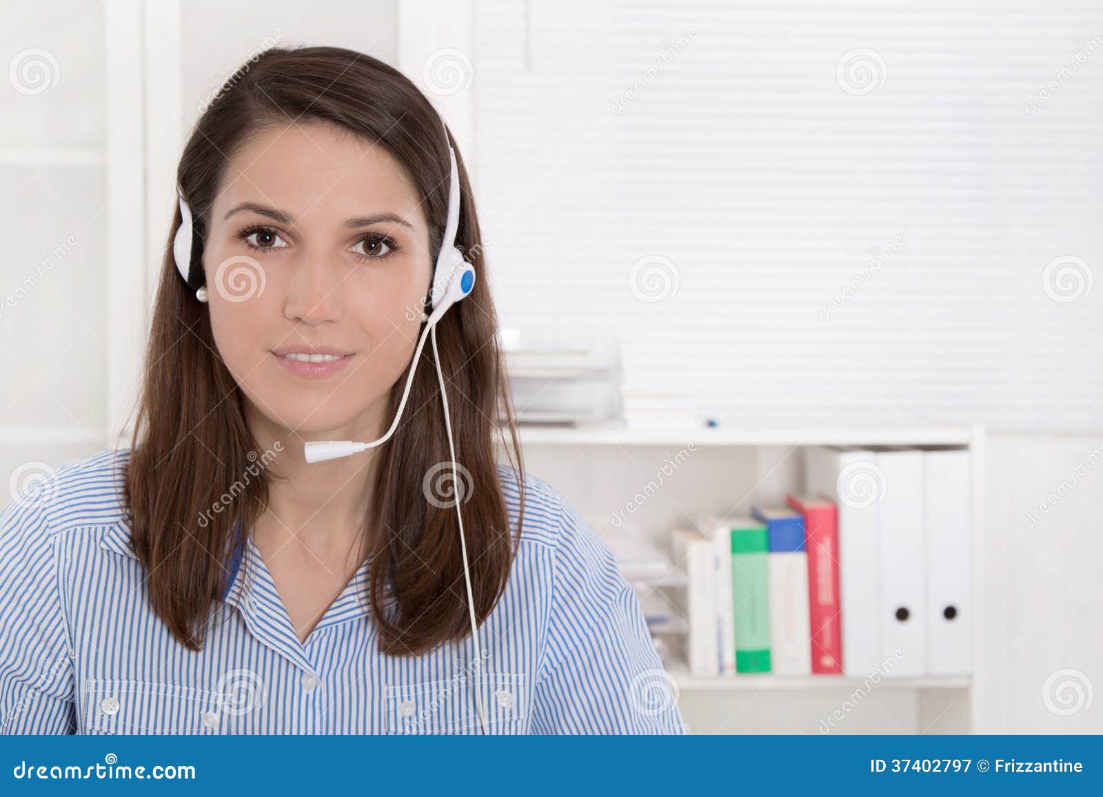 telesales or helpdesk - helpful woman with headset smiling at ca