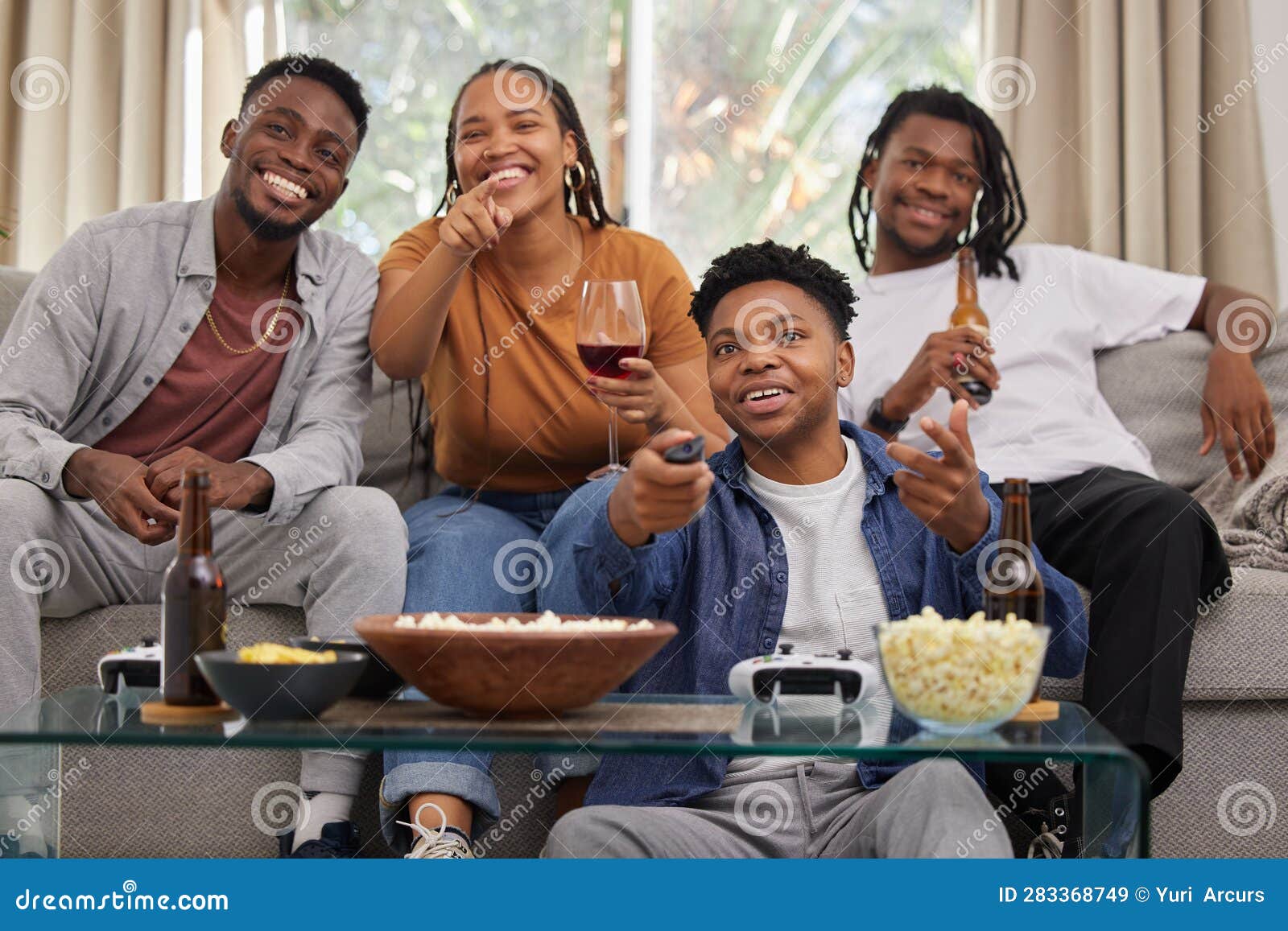 Television Relax and Friends on a Sofa with Beer and Popcorn for