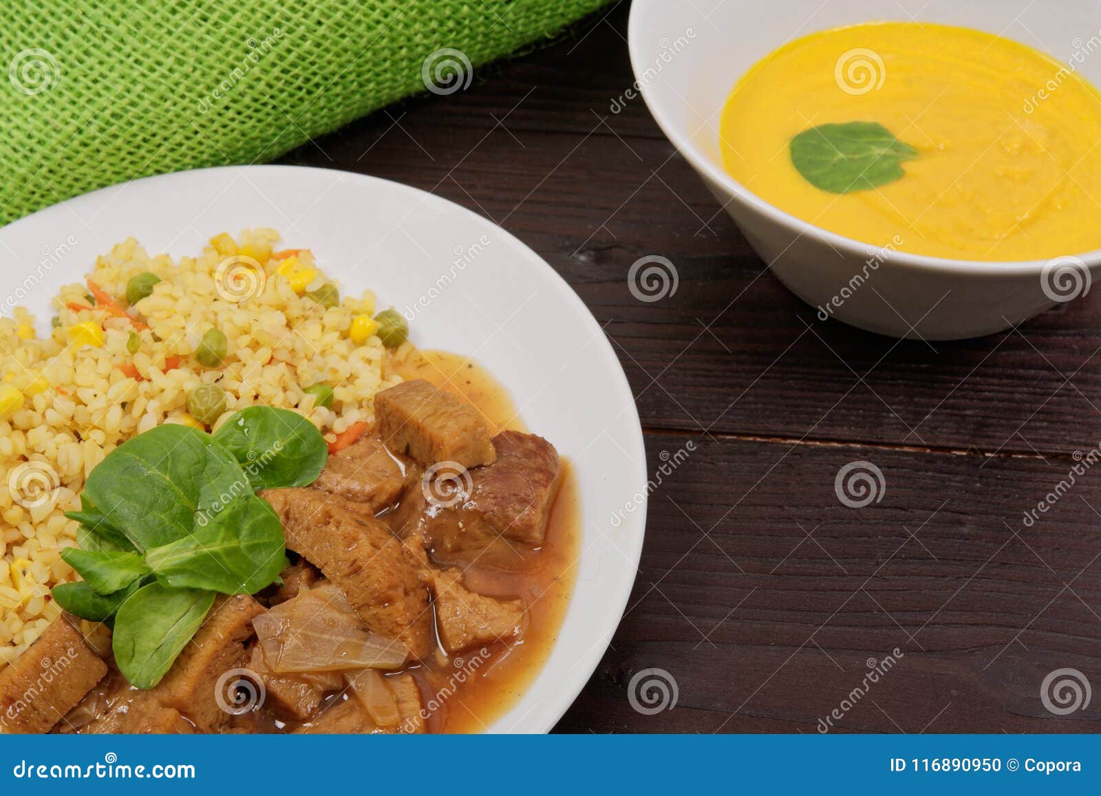 Tempeh with Tomato Sauce and Millets on a Table Stock Photo Image of