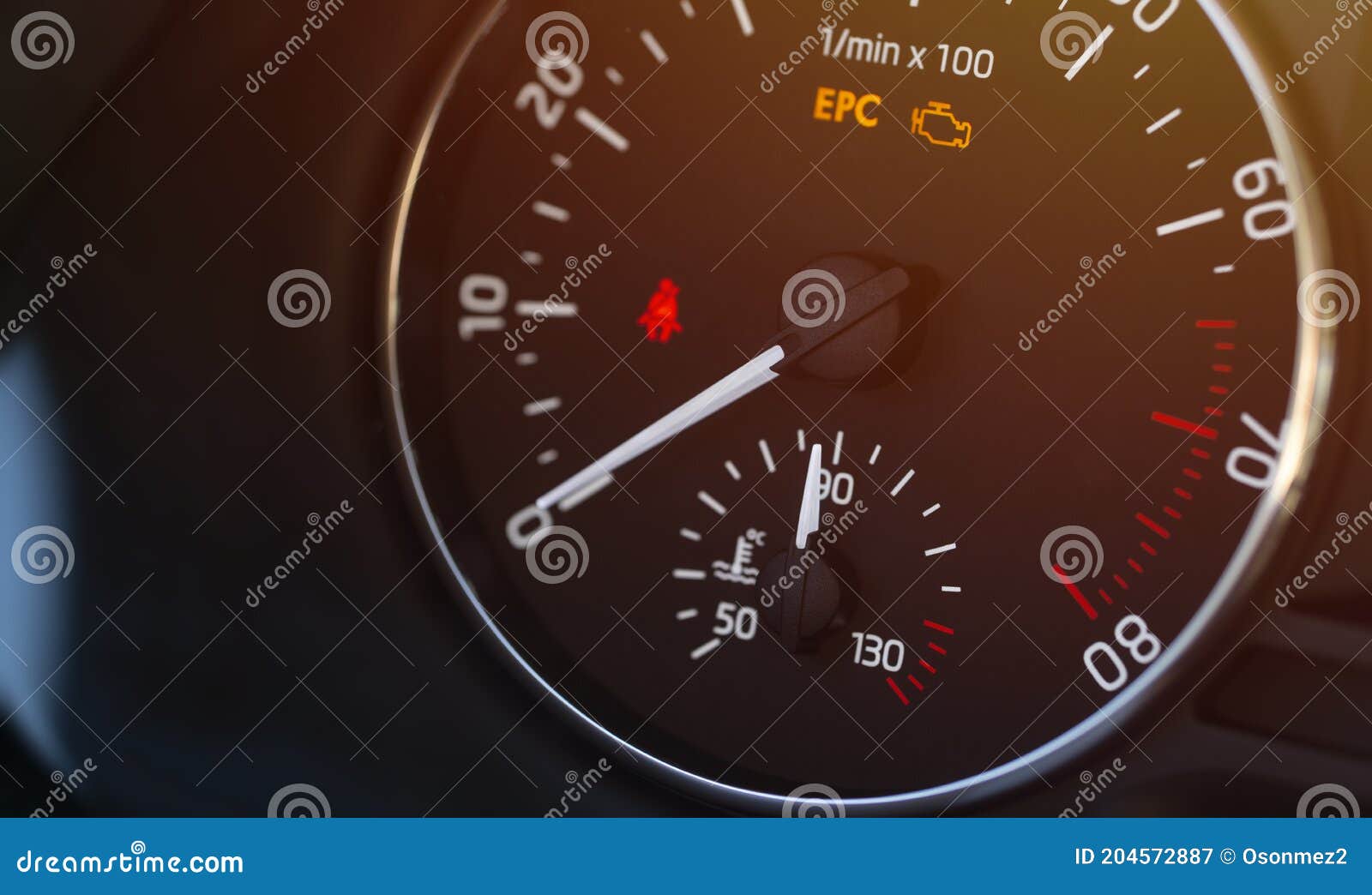 temperature, engine revolutions and warning lights on the vehicle display